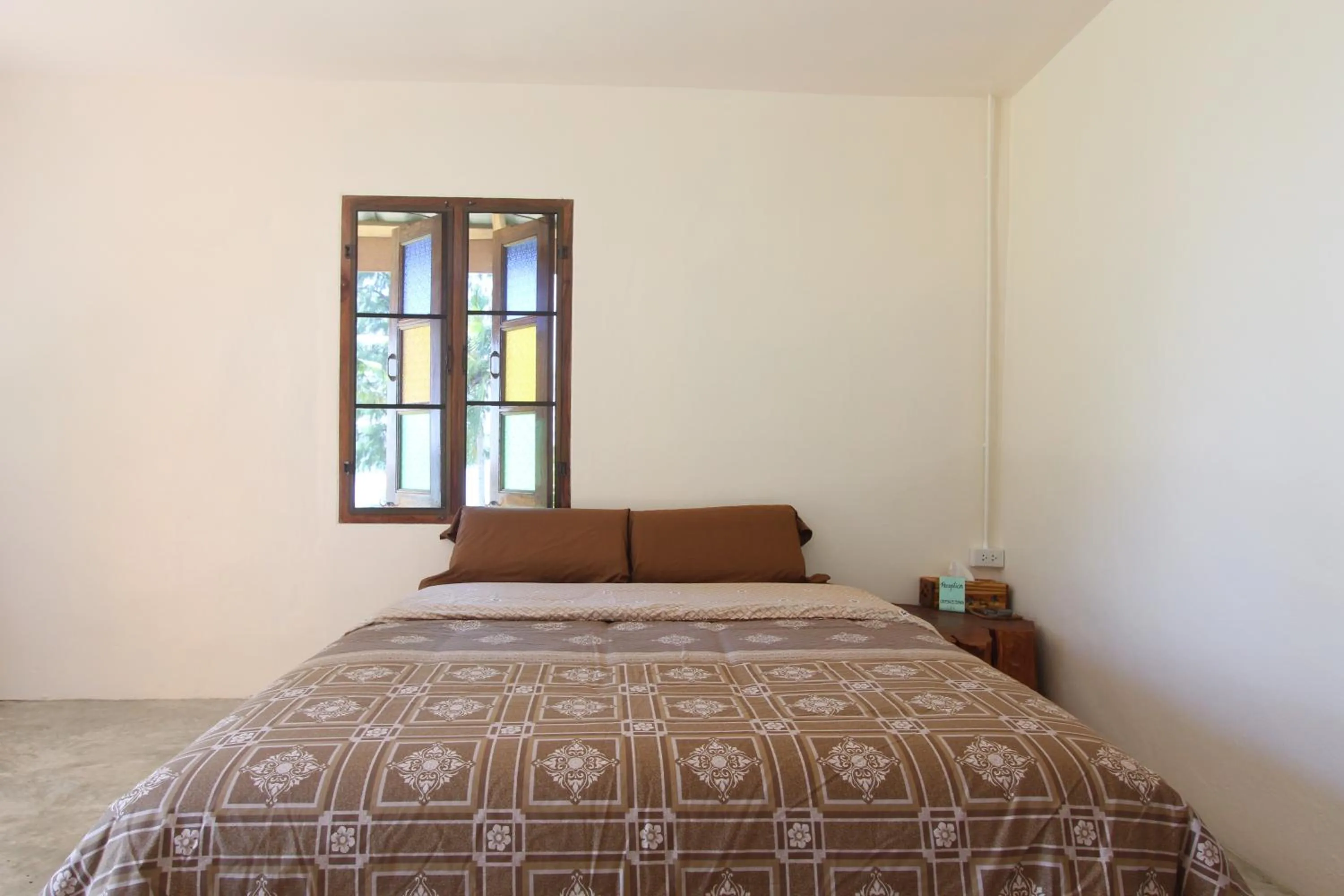 Bed in TK Beach Resort Koh Mak