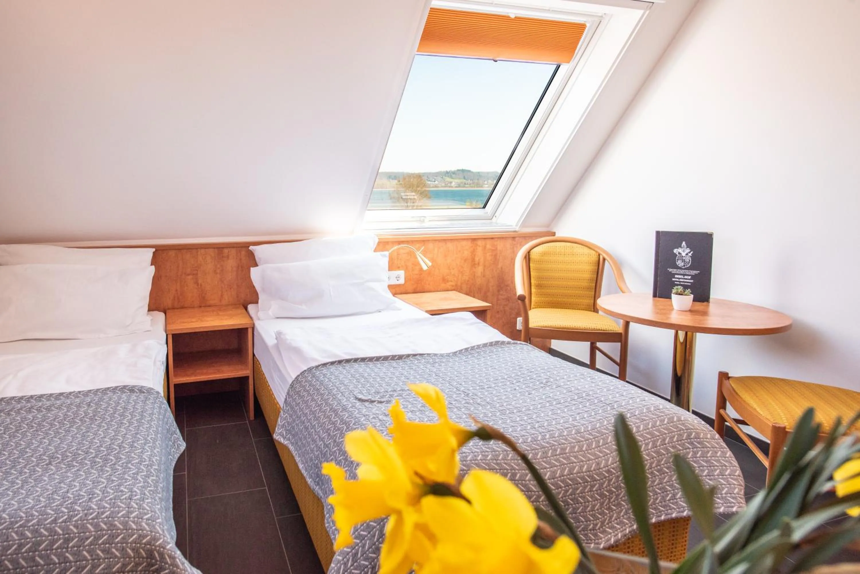 Bedroom, Bed in Insel-Hof Reichenau Hotel-garni