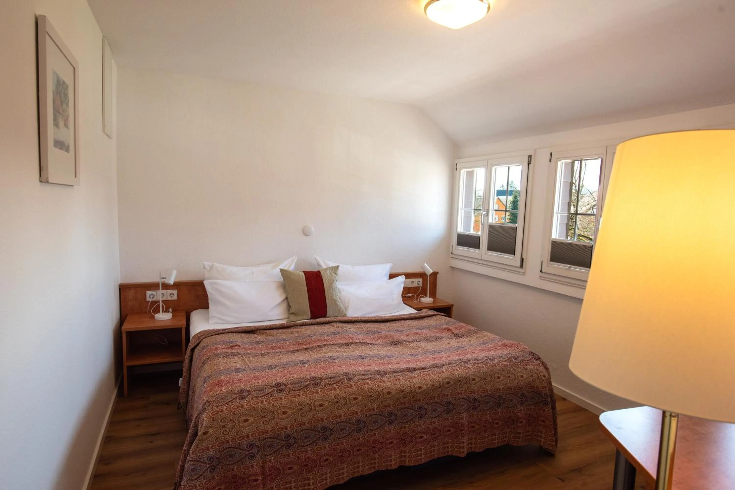 Photo of the whole room, Bed in Insel-Hof Reichenau Hotel-garni