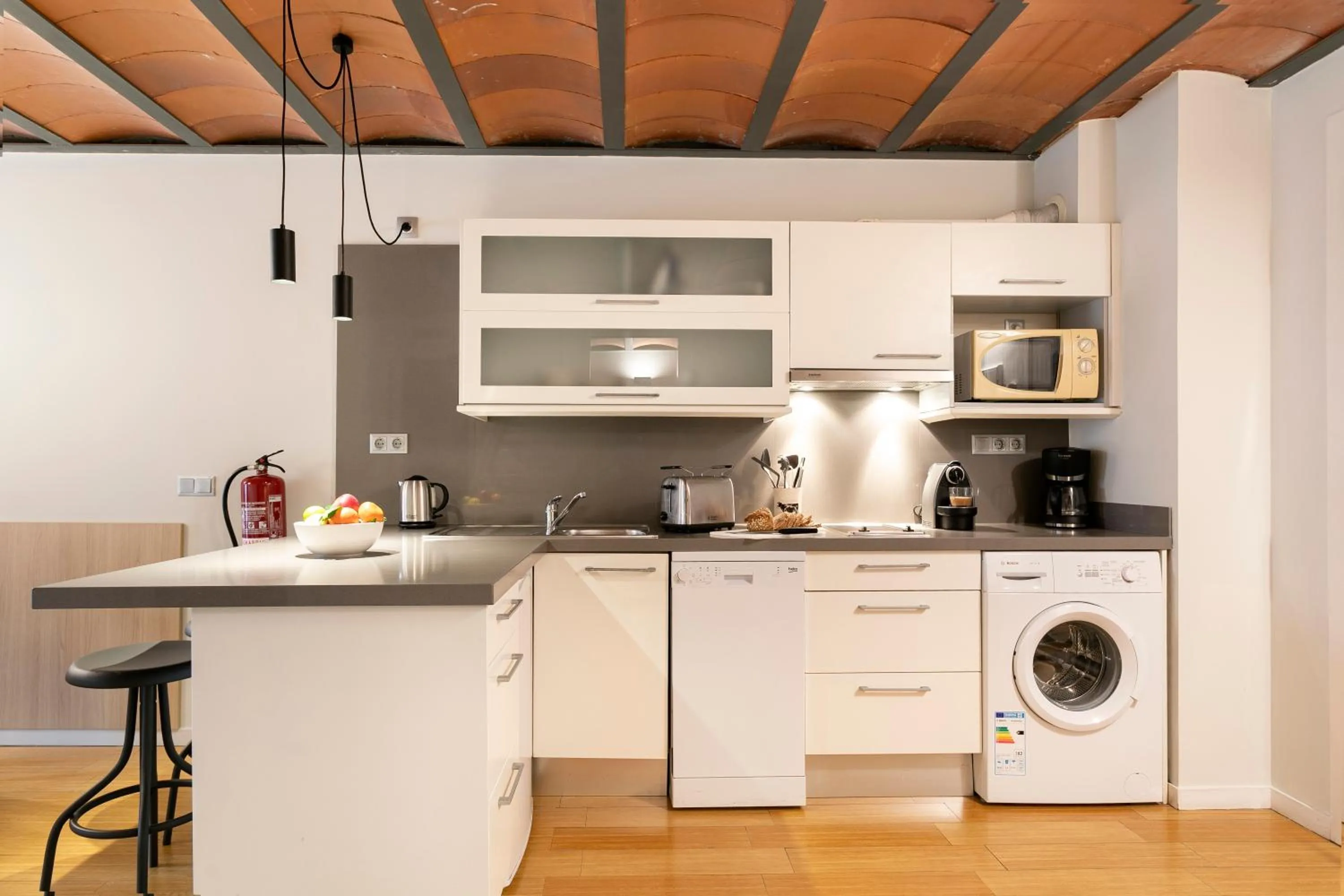 Kitchen or kitchenette in Aspasios Las Ramblas Apartments