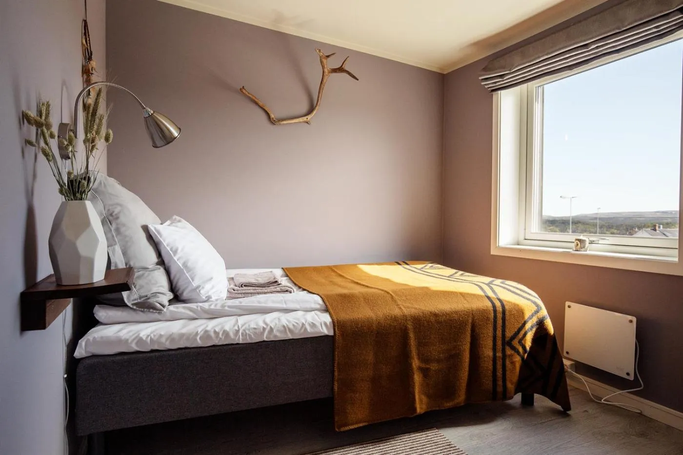 Bed in 8 Seasons Hotel