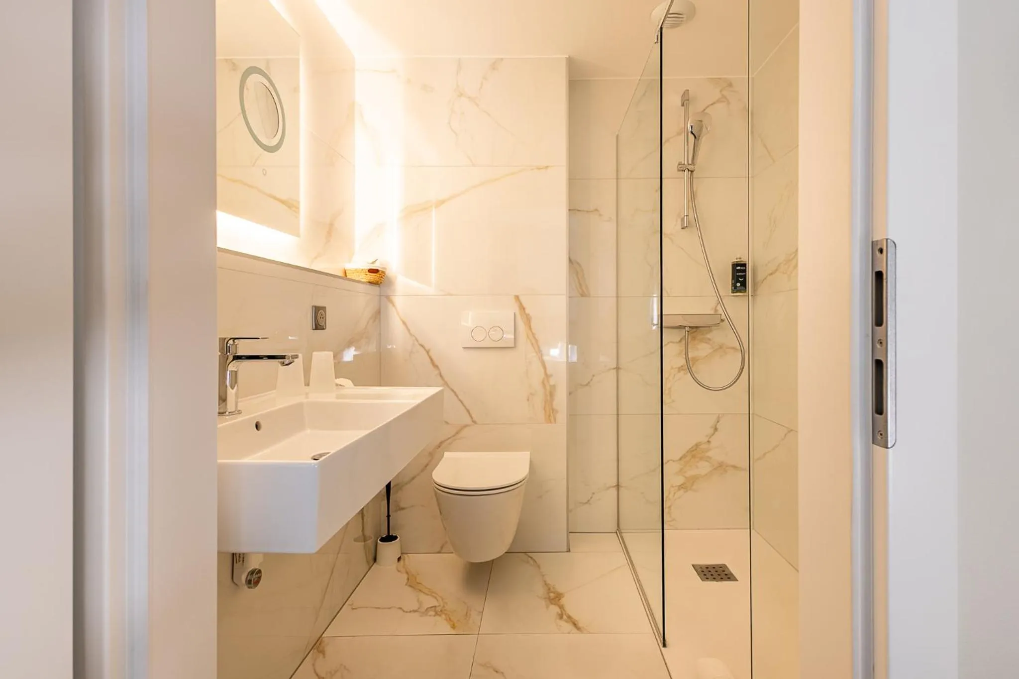 Bathroom in Brit Hotel, Spa & Restaurant - Colmar Est