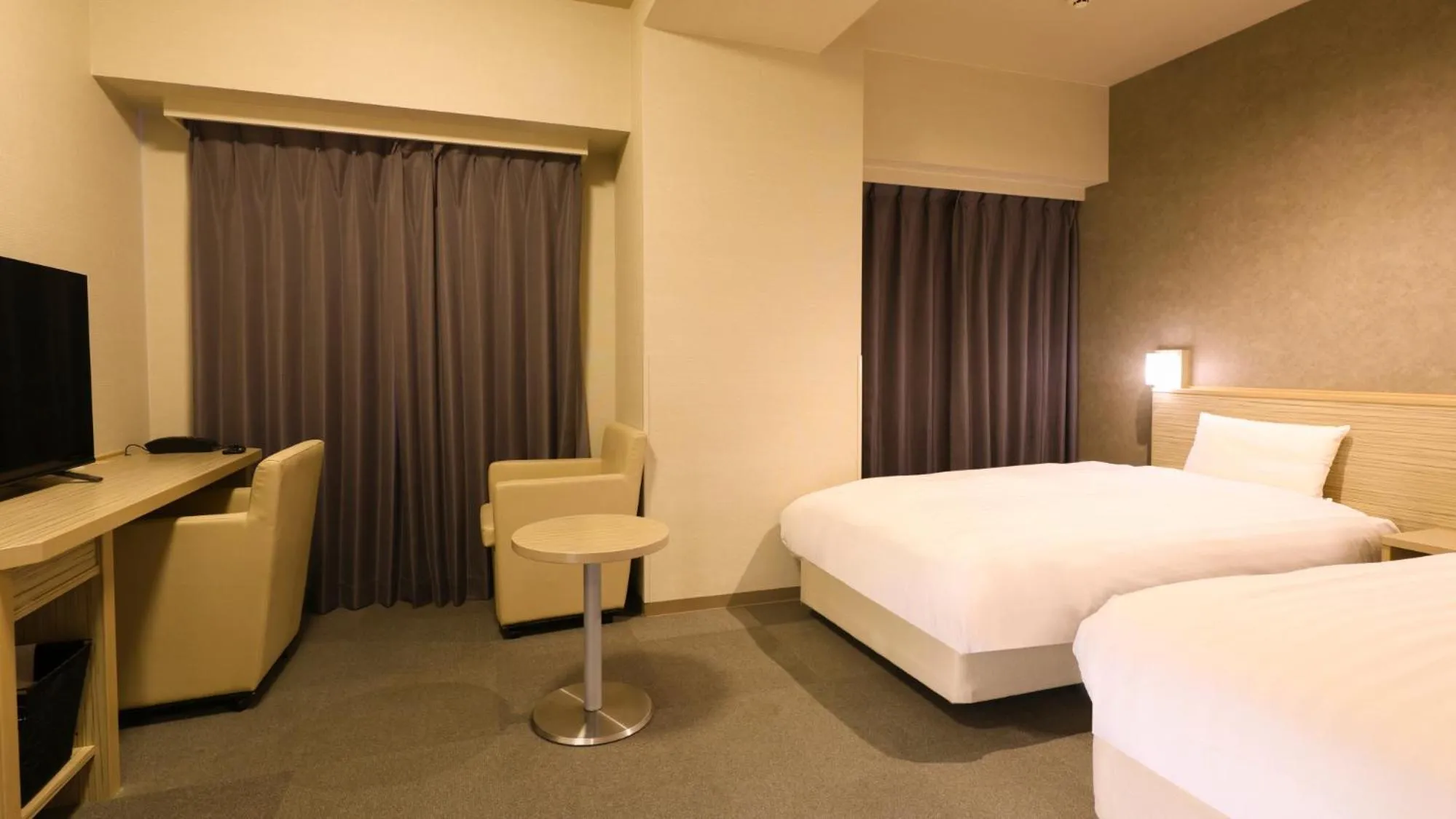 Bed in Dormy Inn Mishima