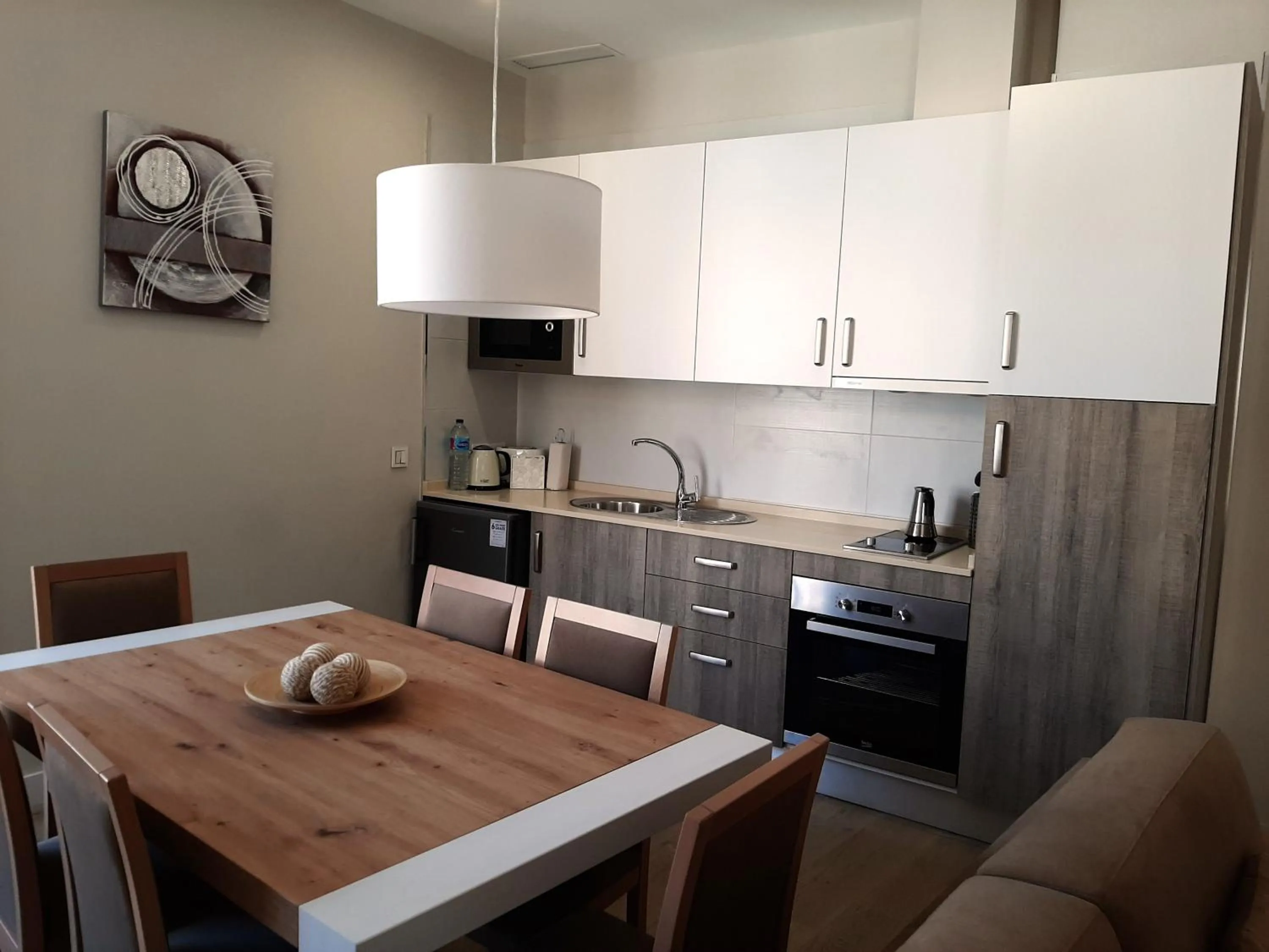 Kitchen or kitchenette in Apartamentos Pinar Malaga Centro
