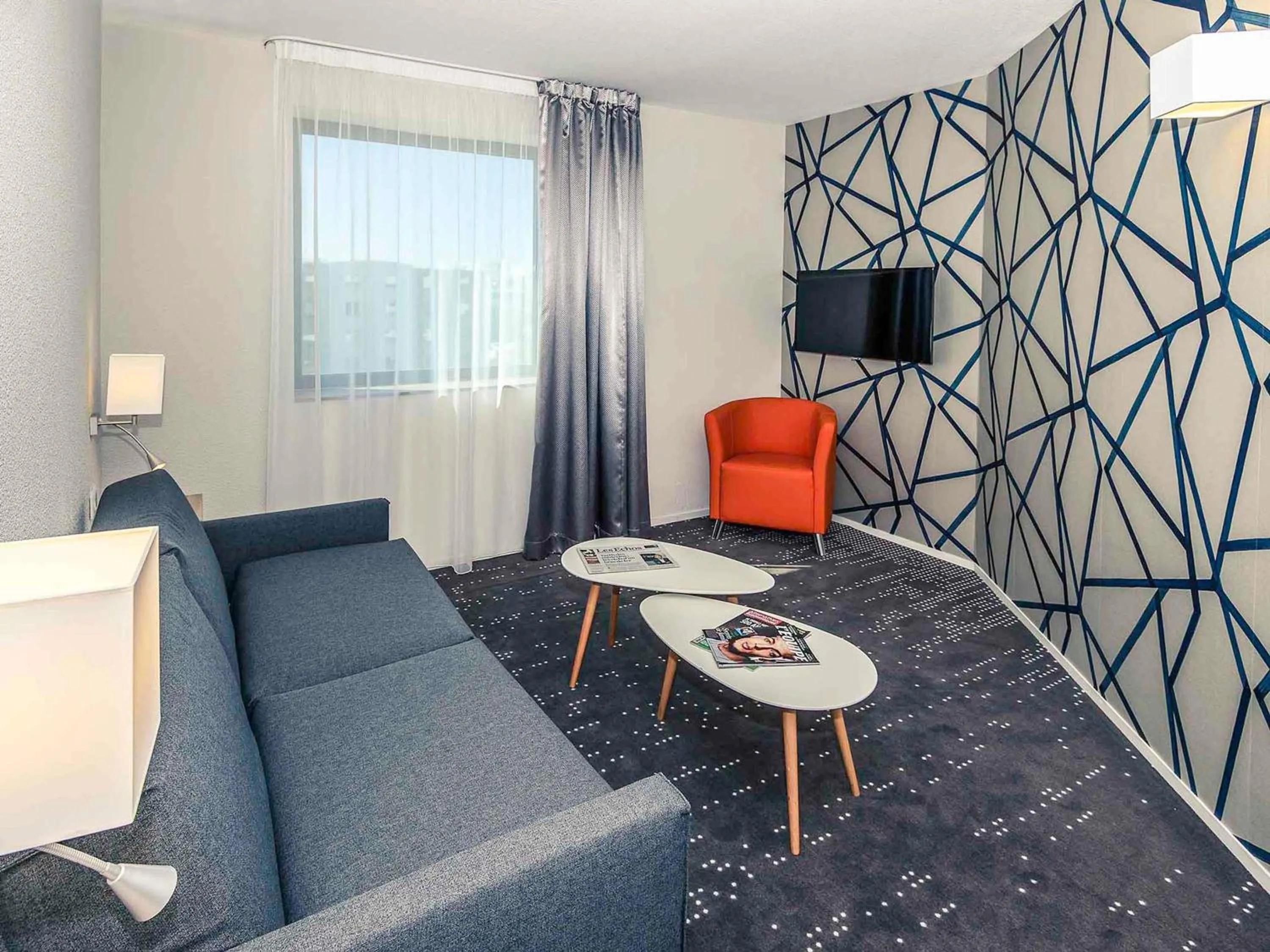 Bedroom in Mercure Poitiers Site du Futuroscope