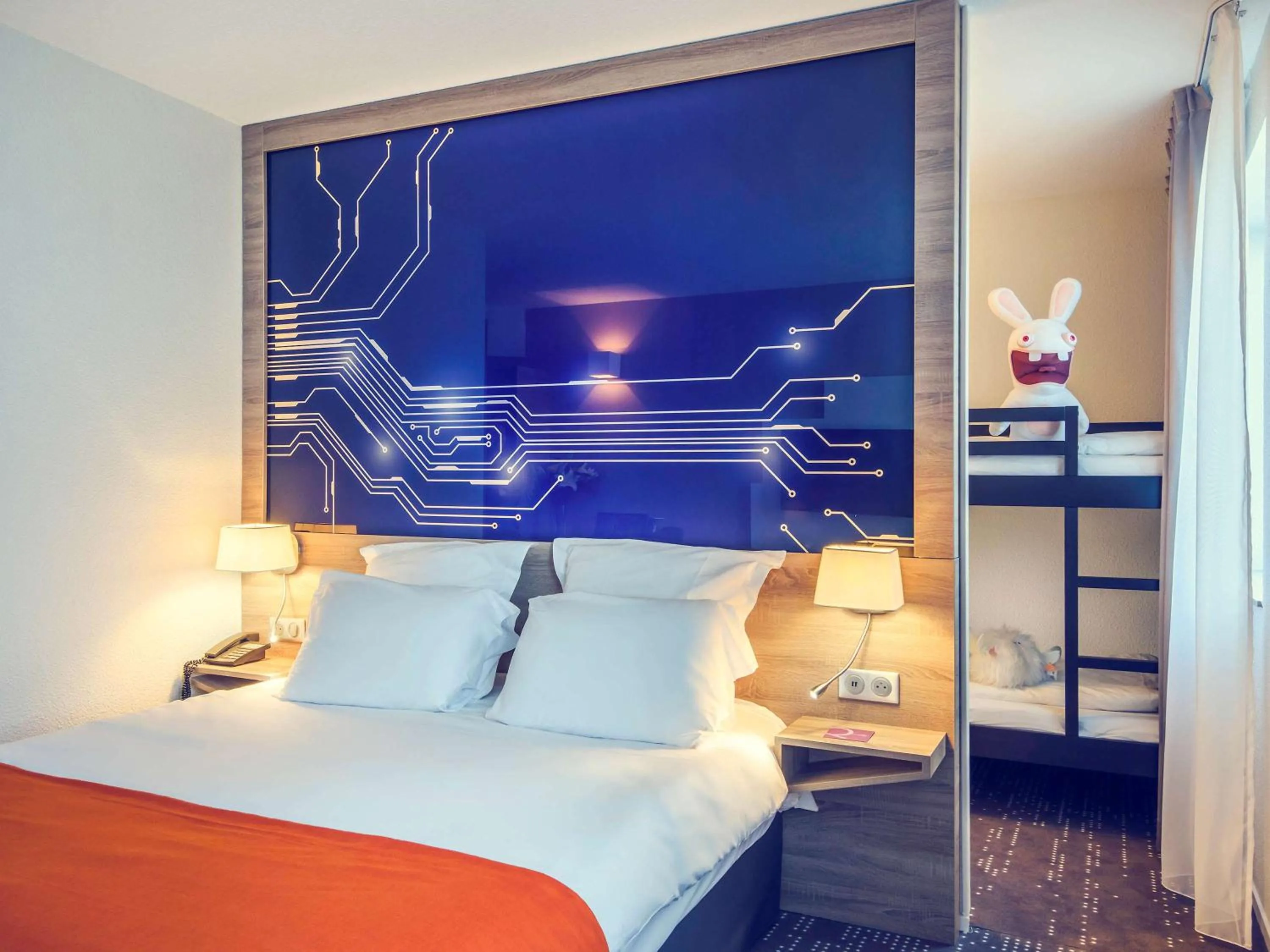 Photo of the whole room, Bed in Mercure Poitiers Site du Futuroscope