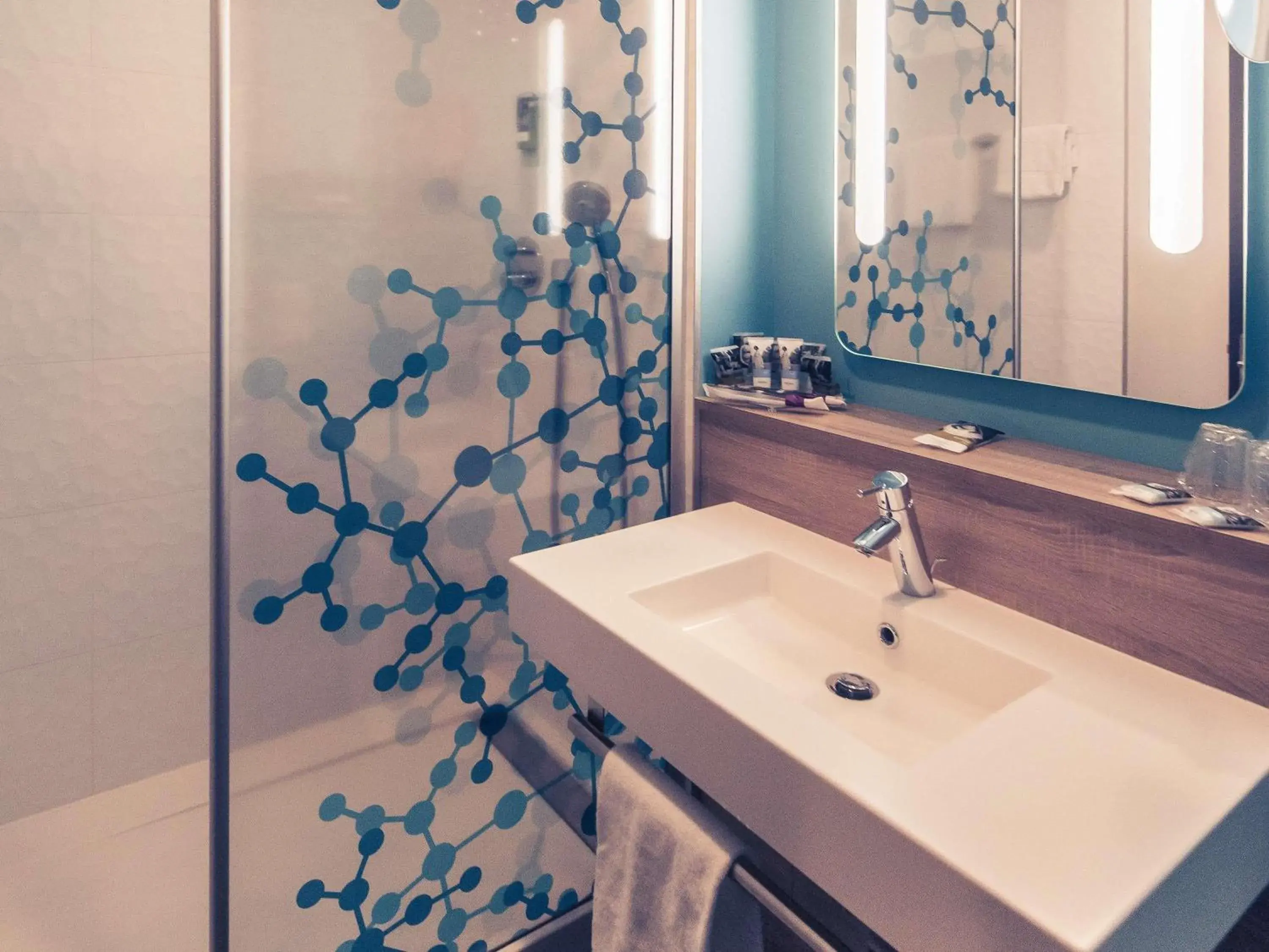 Bedroom in Mercure Poitiers Site du Futuroscope Bedroom in Mercure Poitiers Site du Futuroscope