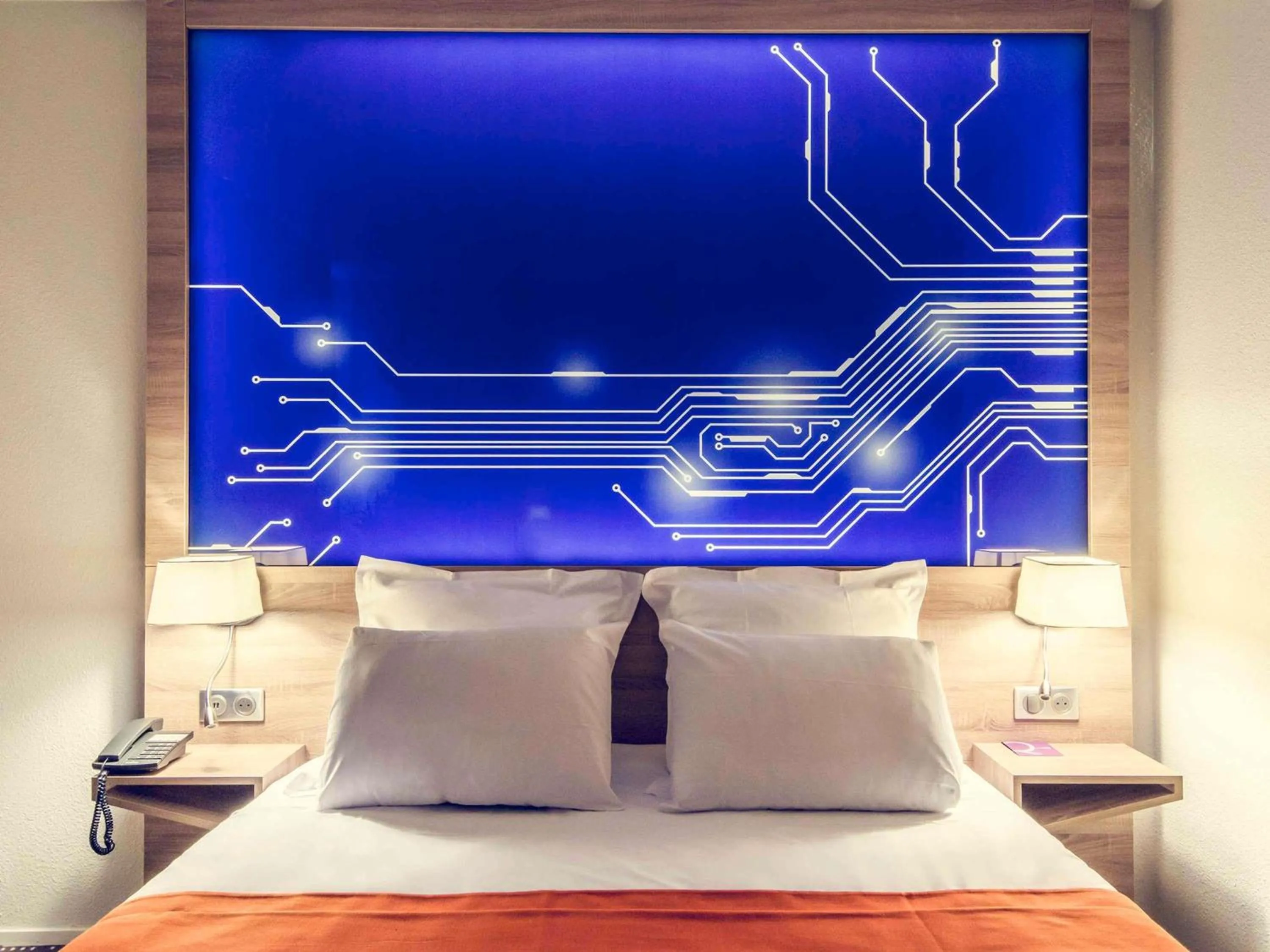 Bedroom in Mercure Poitiers Site du Futuroscope