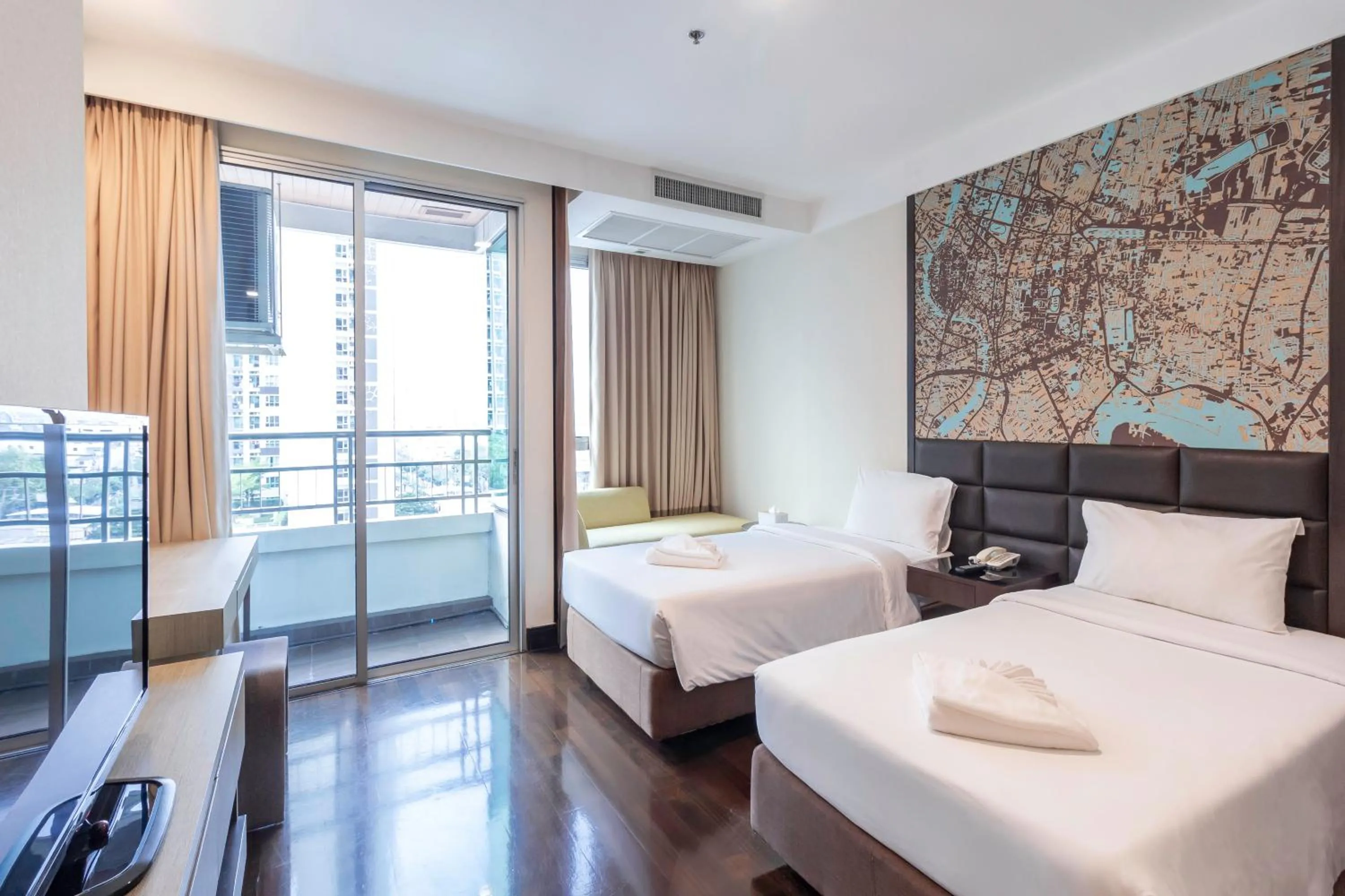 Bed in Jasmine Grande Residence