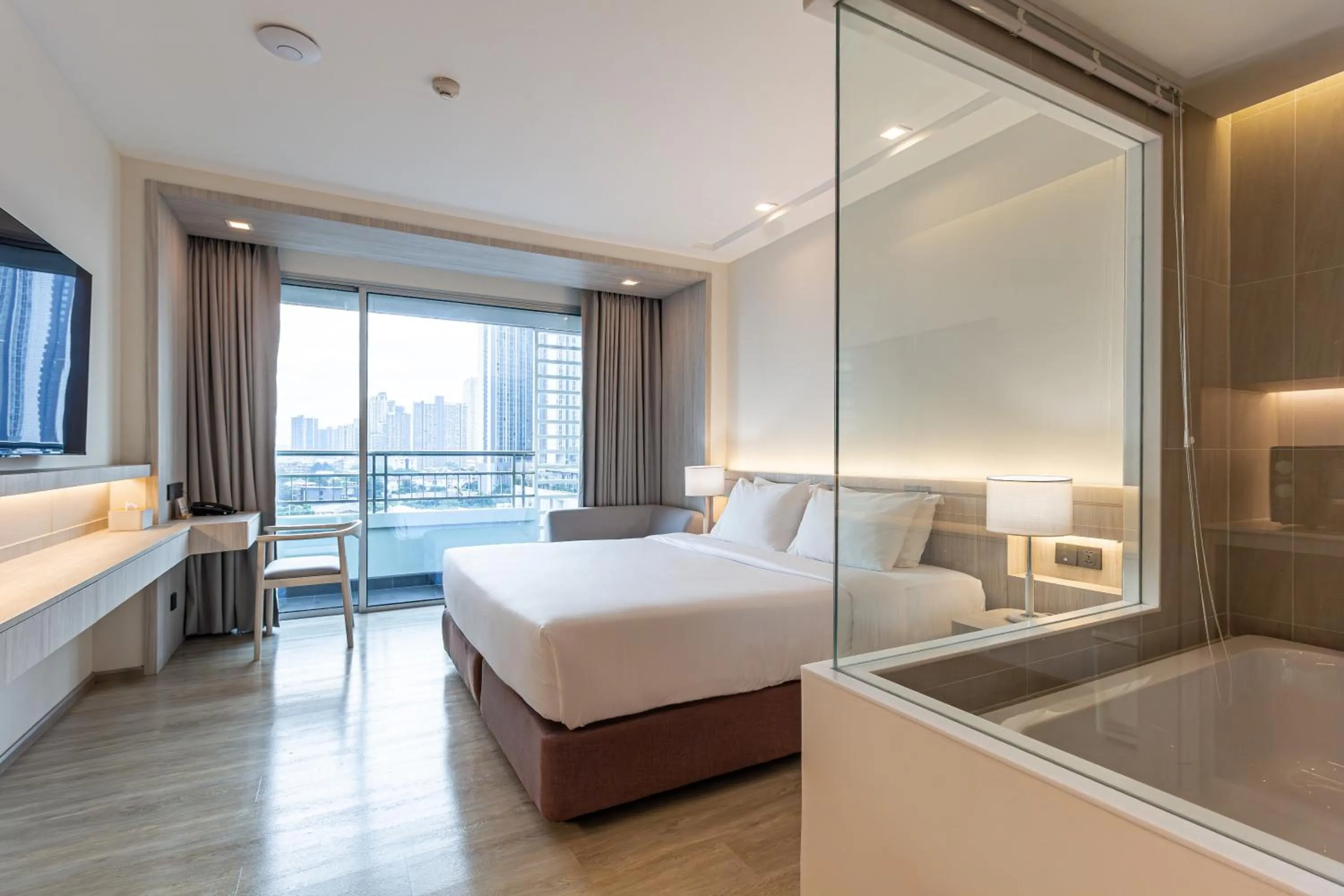 Bed in Jasmine Grande Residence