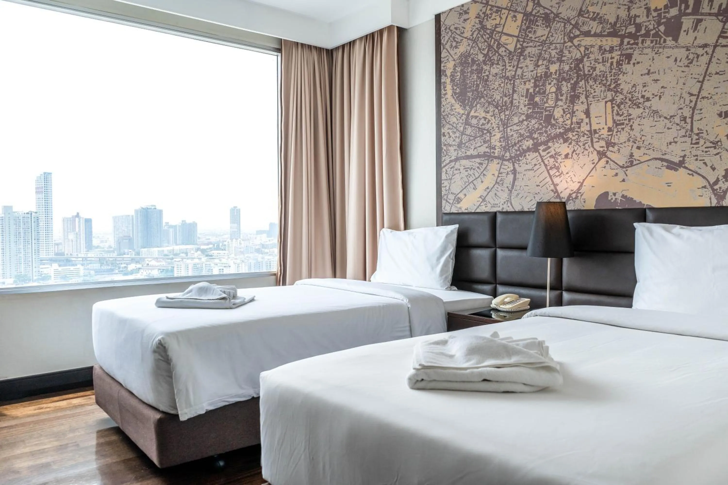 Bed in Jasmine Grande Residence