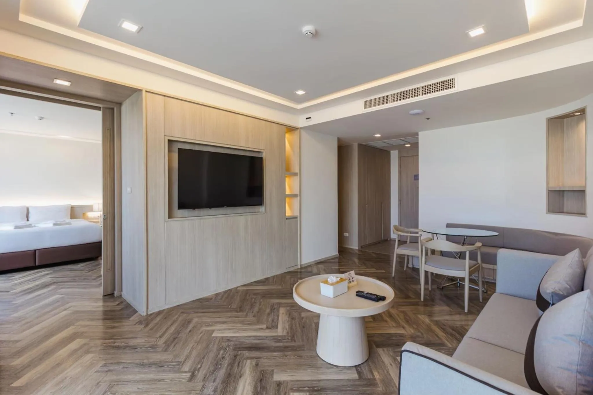 Living room, Bed in Jasmine Grande Residence