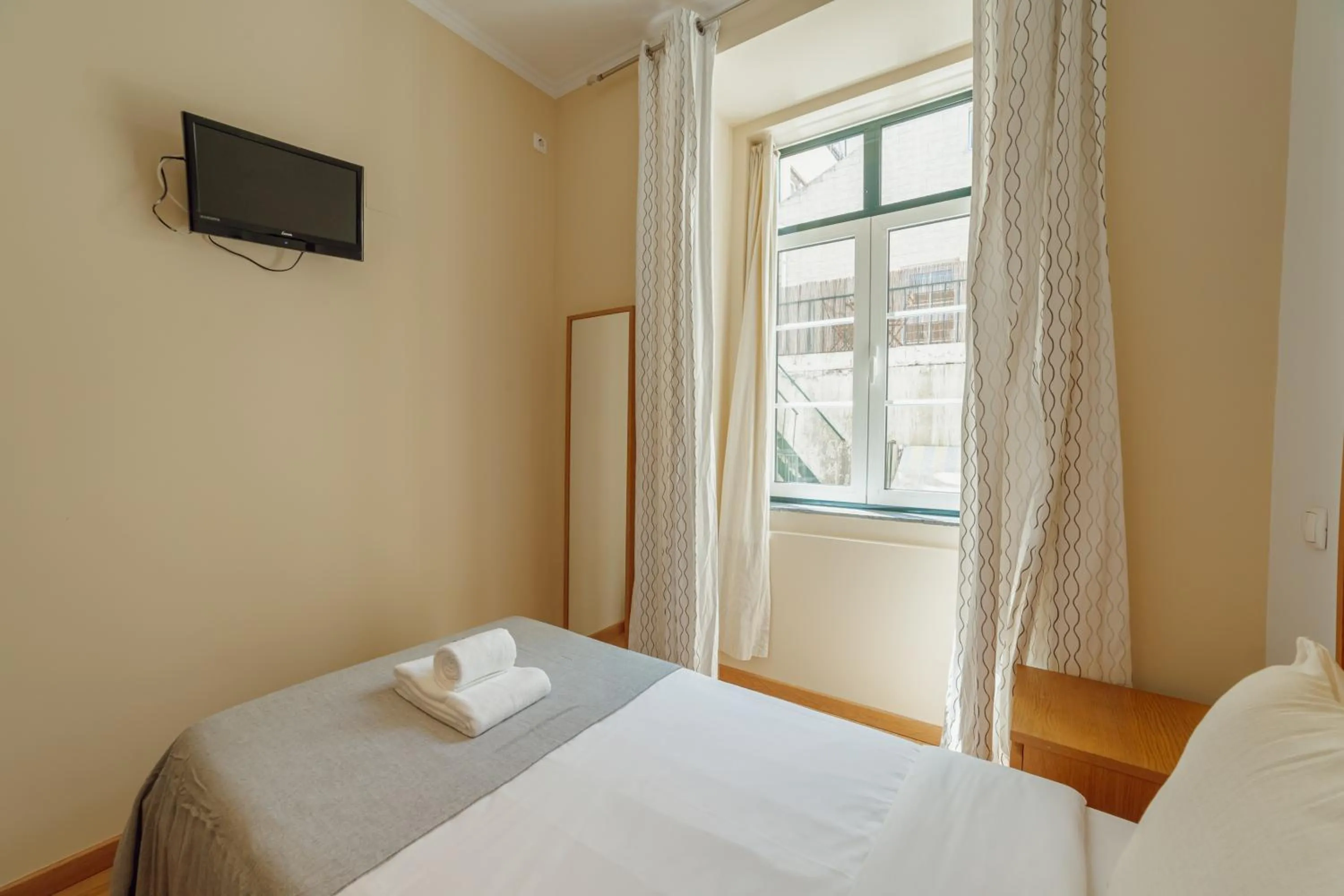 Bed in Baixa GuestHouse