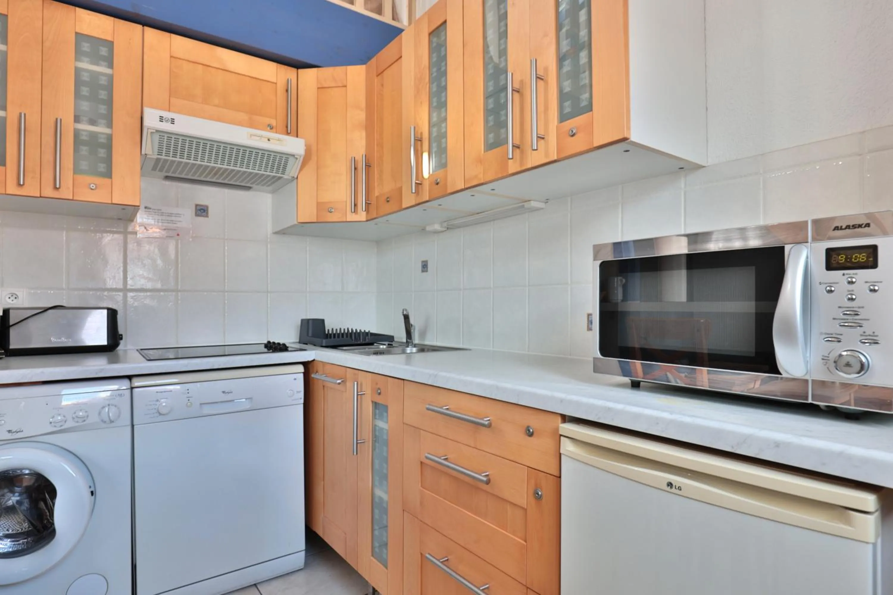 kitchen in Hôtel & Appart-hôtel Olatua