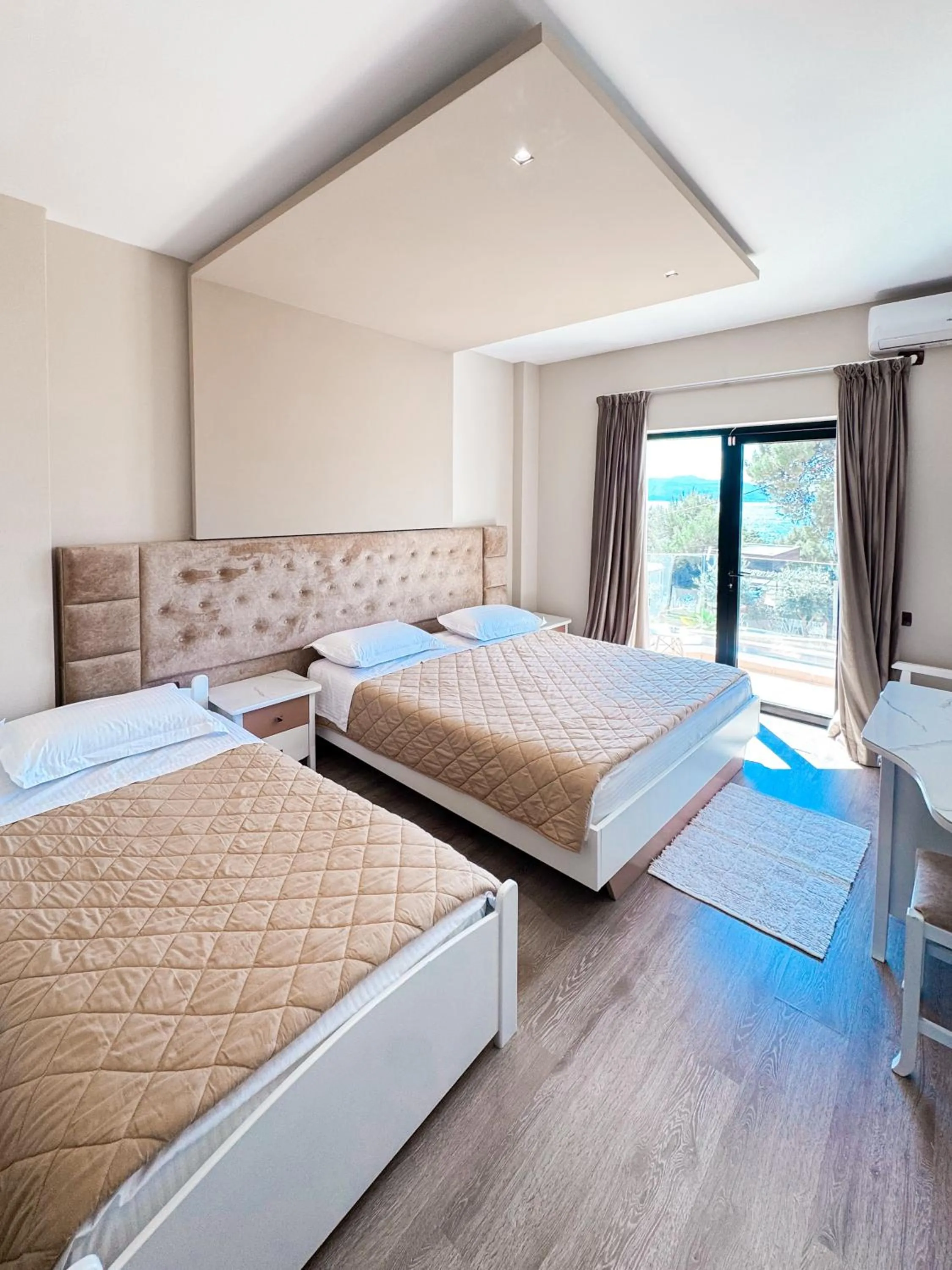 Photo of the whole room, Bed in New Heaven Hotel