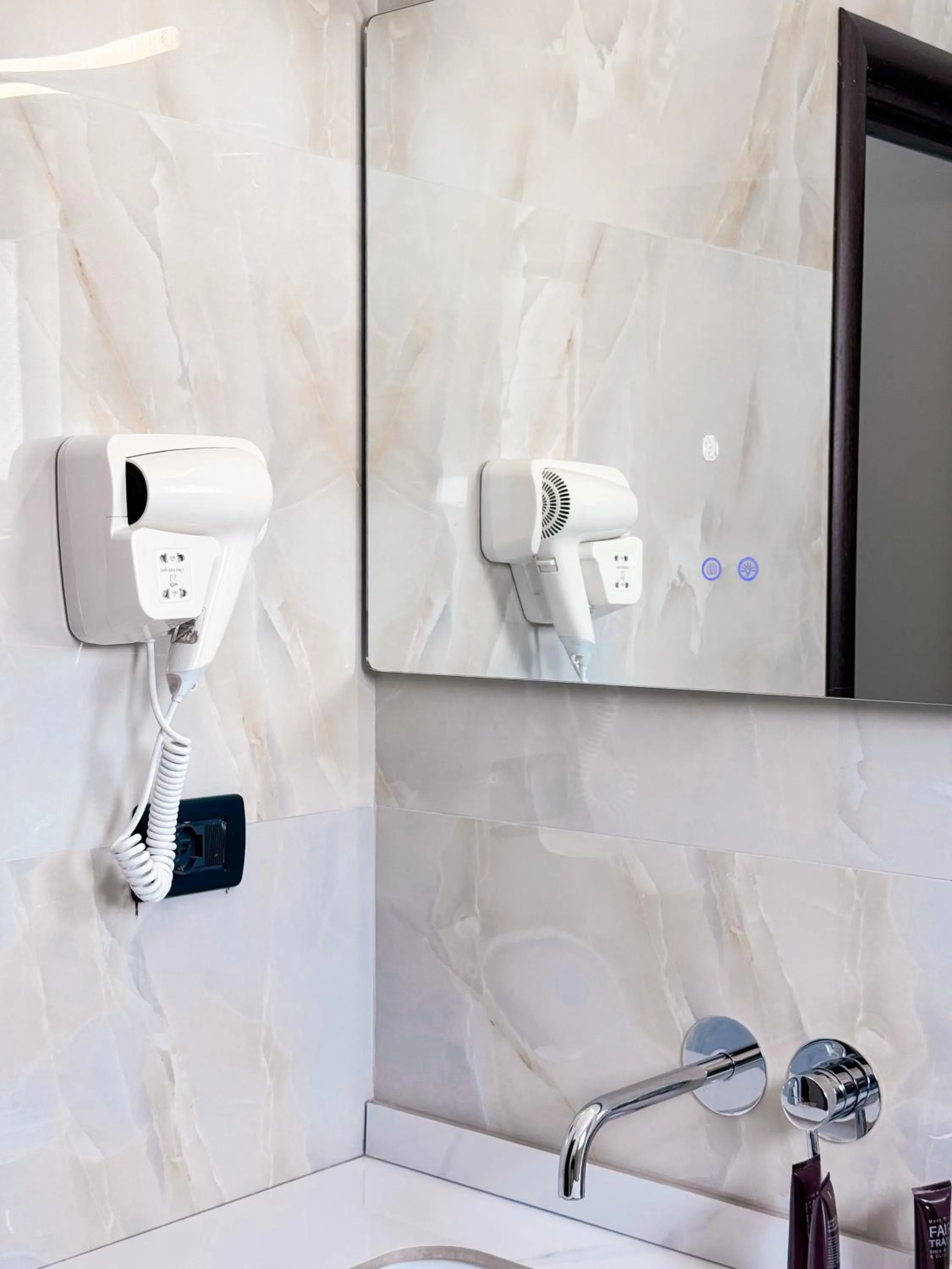 Bathroom in New Heaven Hotel