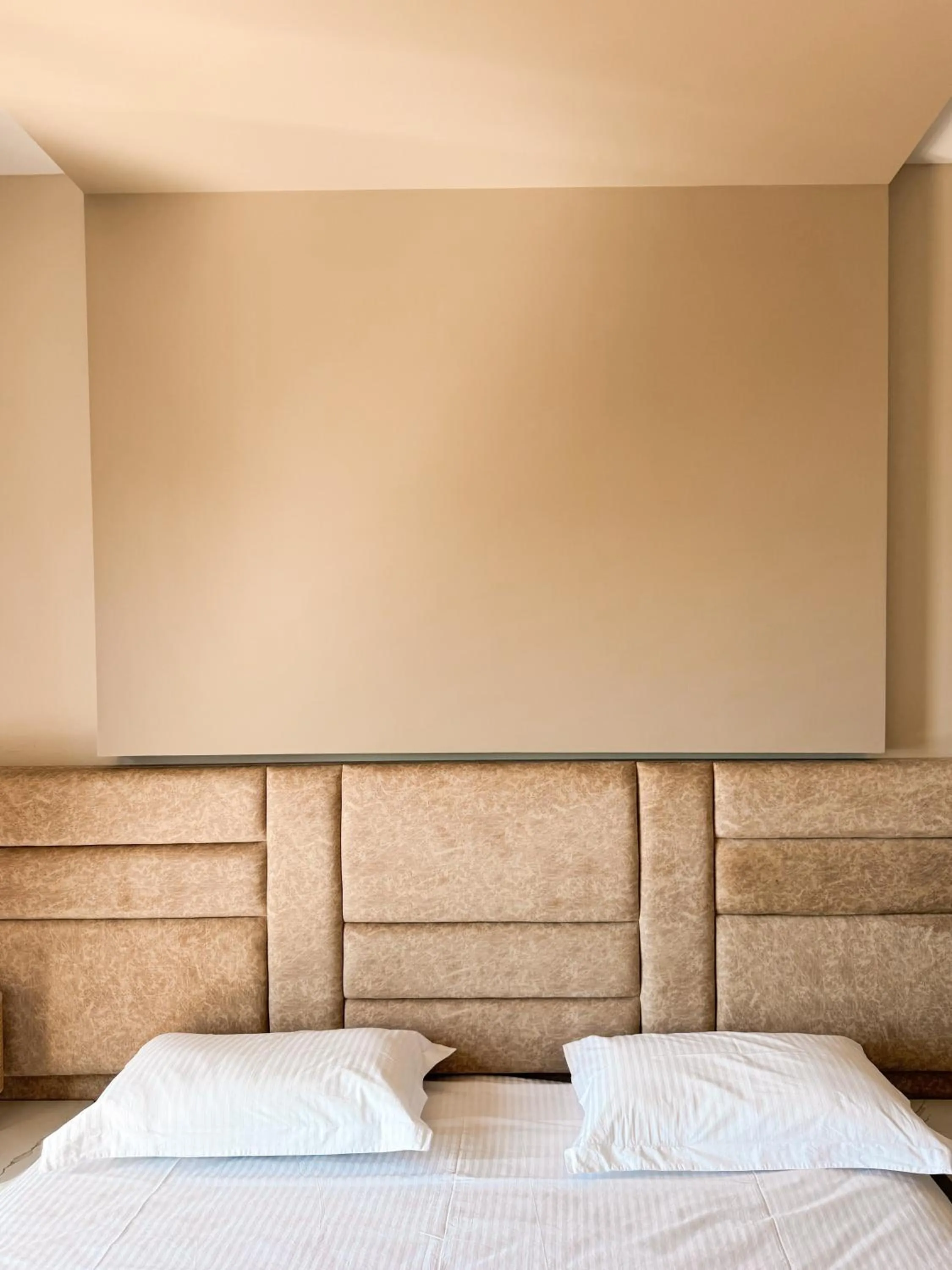 Bed in New Heaven Hotel