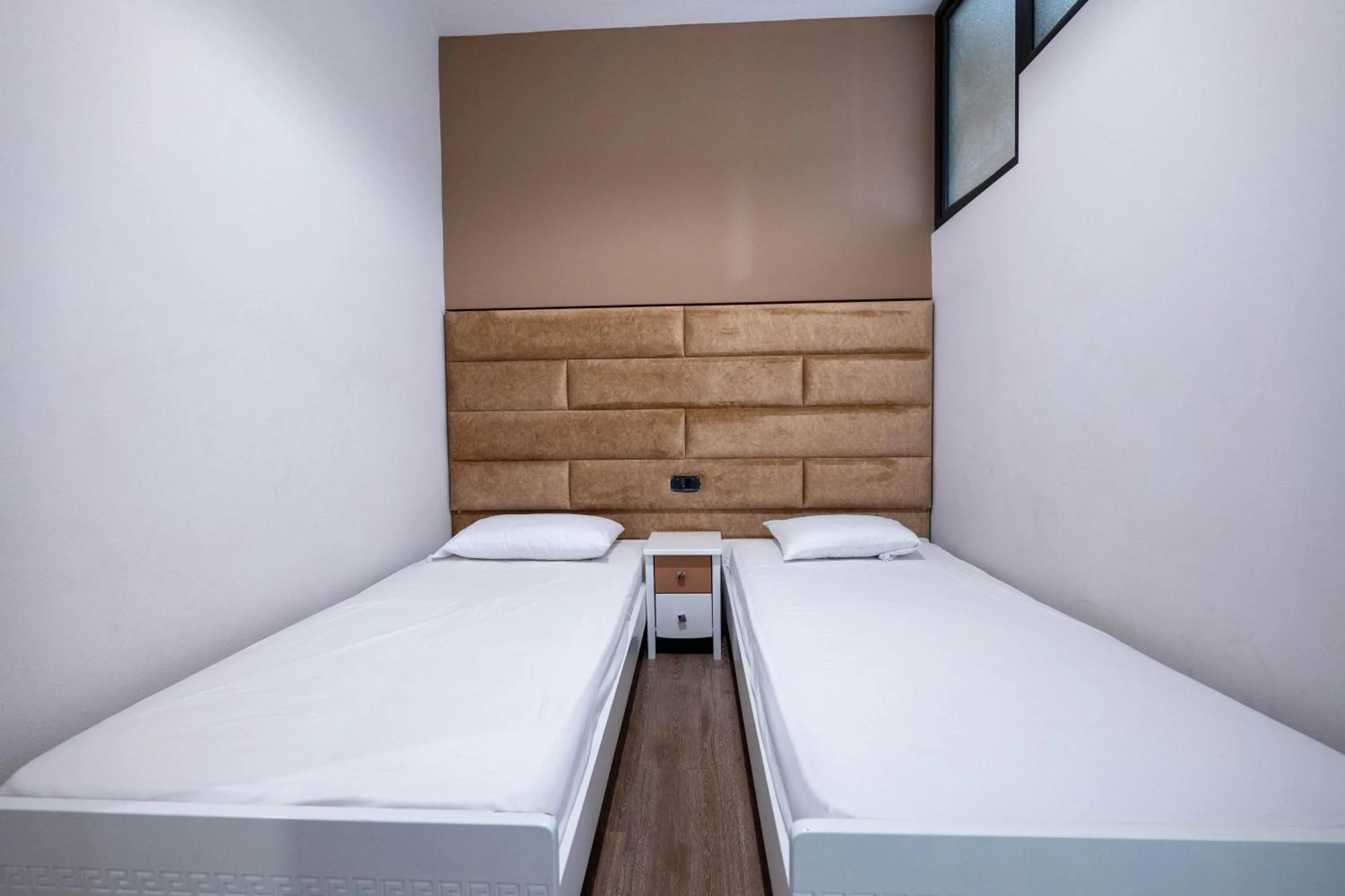 Bed in New Heaven Hotel