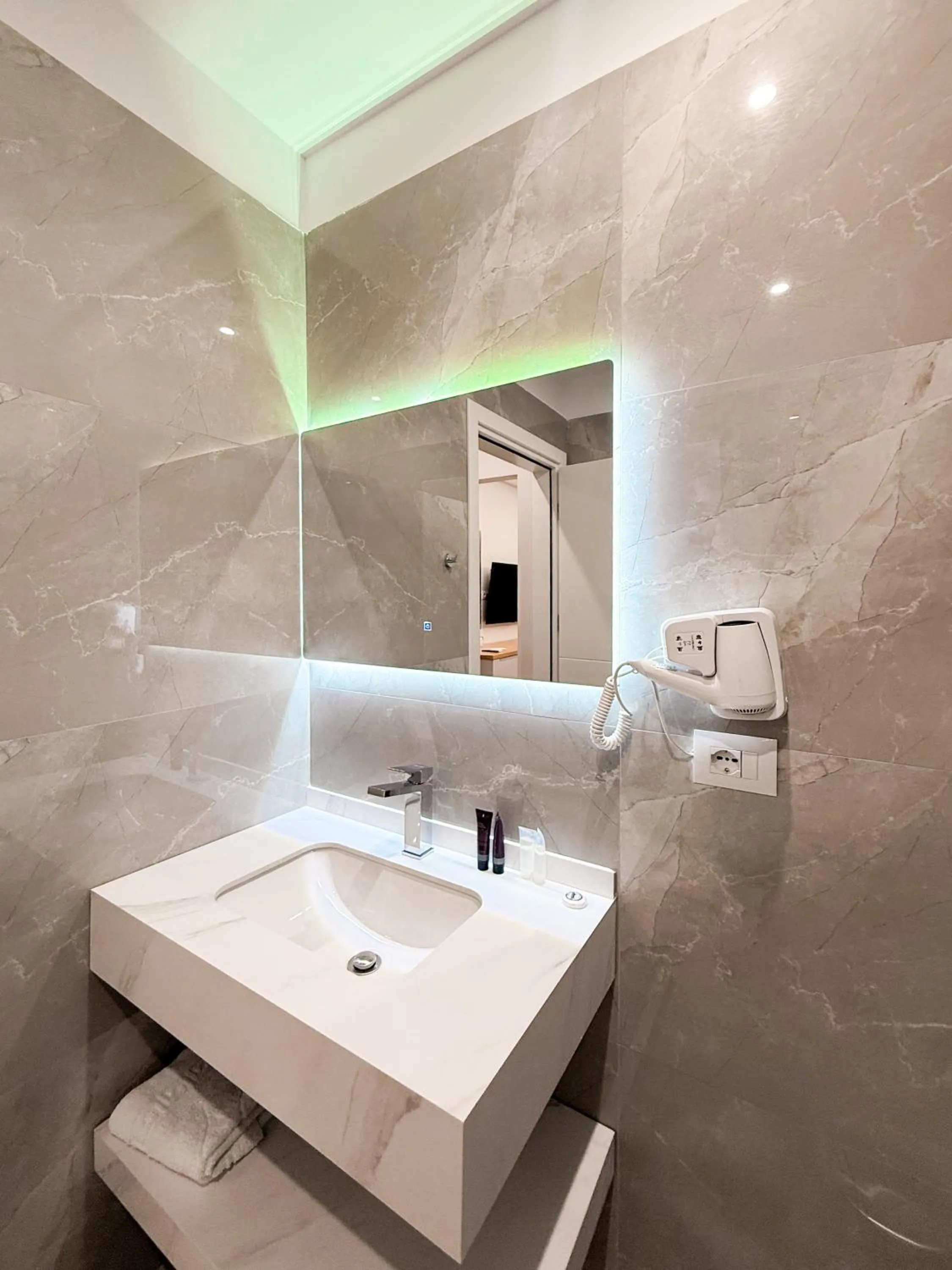 Bathroom in New Heaven Hotel