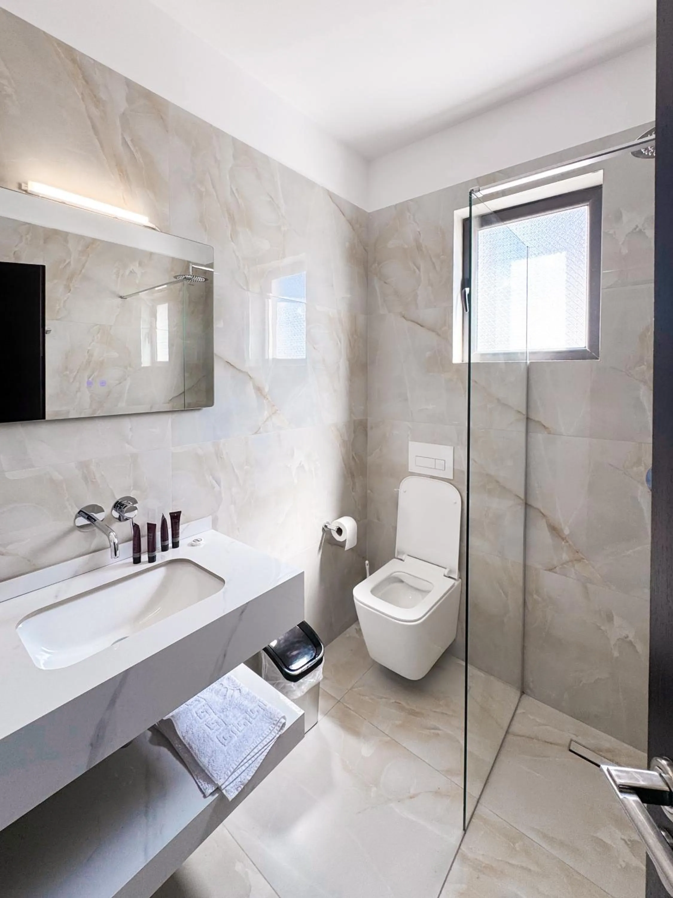 Bathroom in New Heaven Hotel