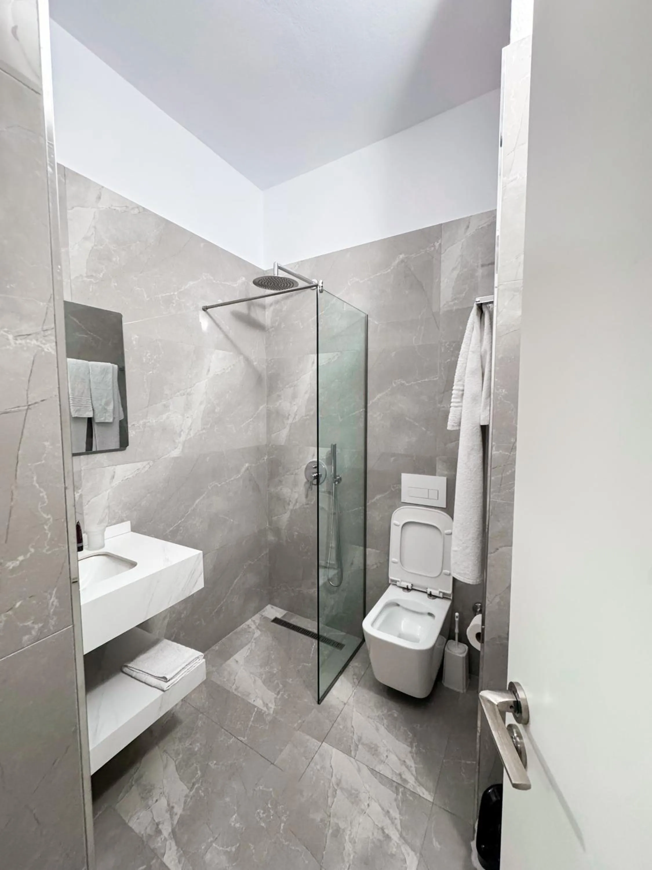 Bathroom in New Heaven Hotel