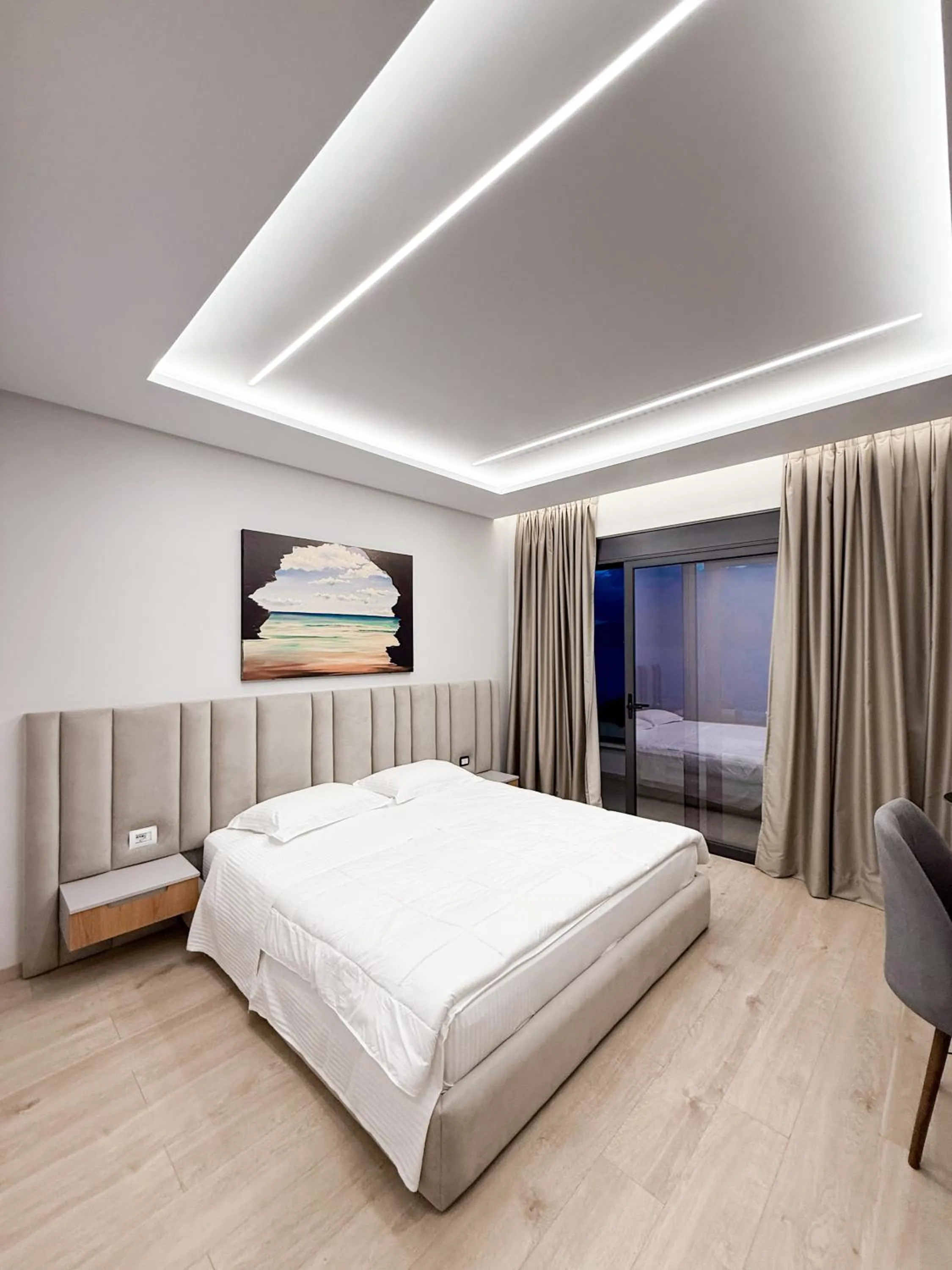 Photo of the whole room, Bed in New Heaven Hotel