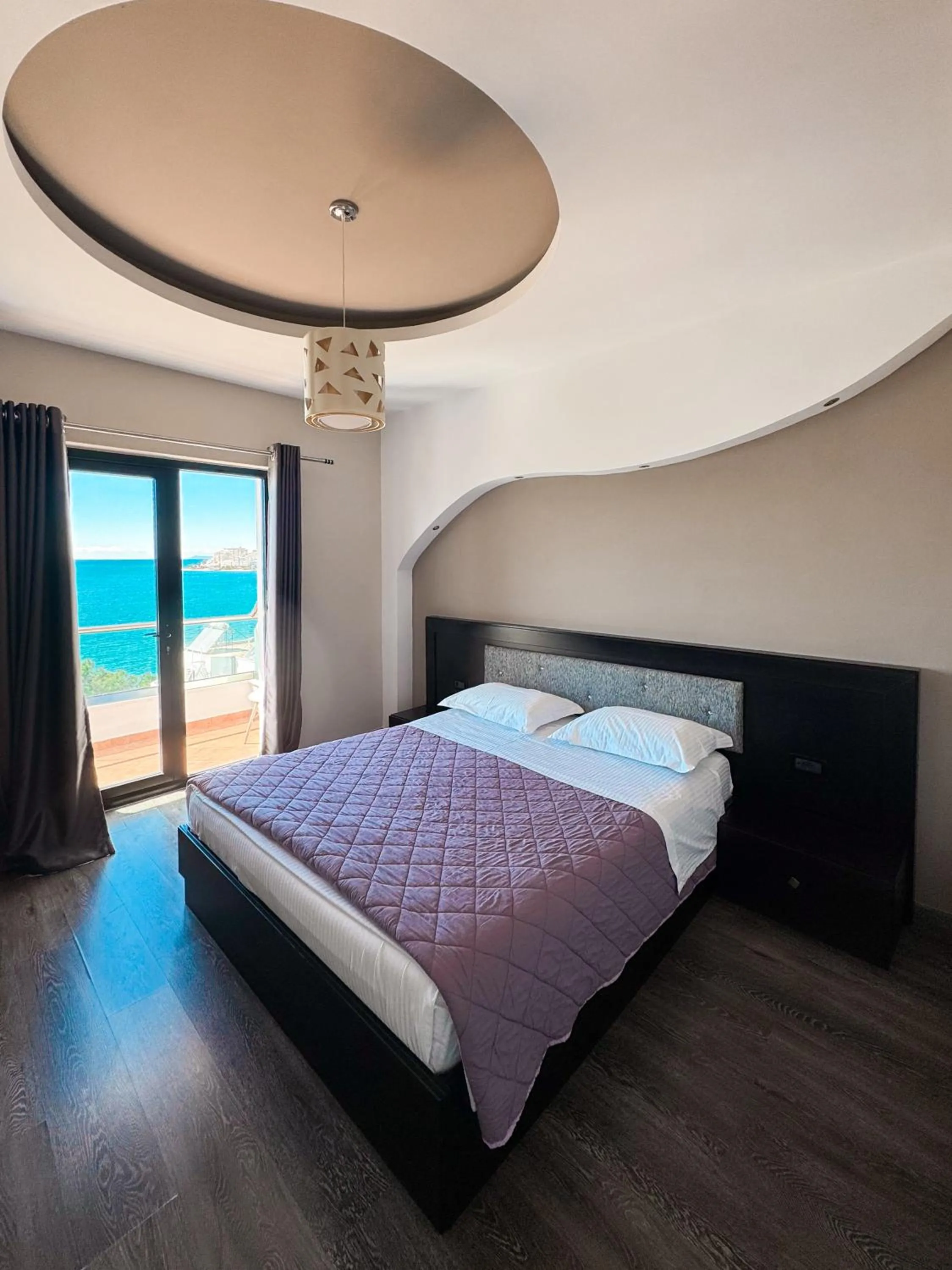 Photo of the whole room, Bed in New Heaven Hotel