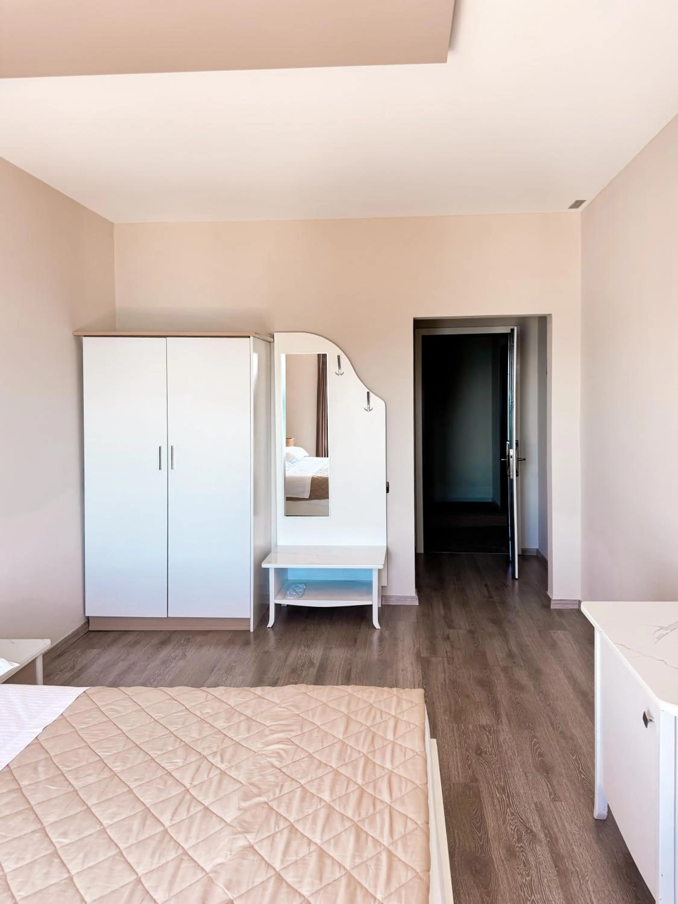 Photo of the whole room, Bed in New Heaven Hotel