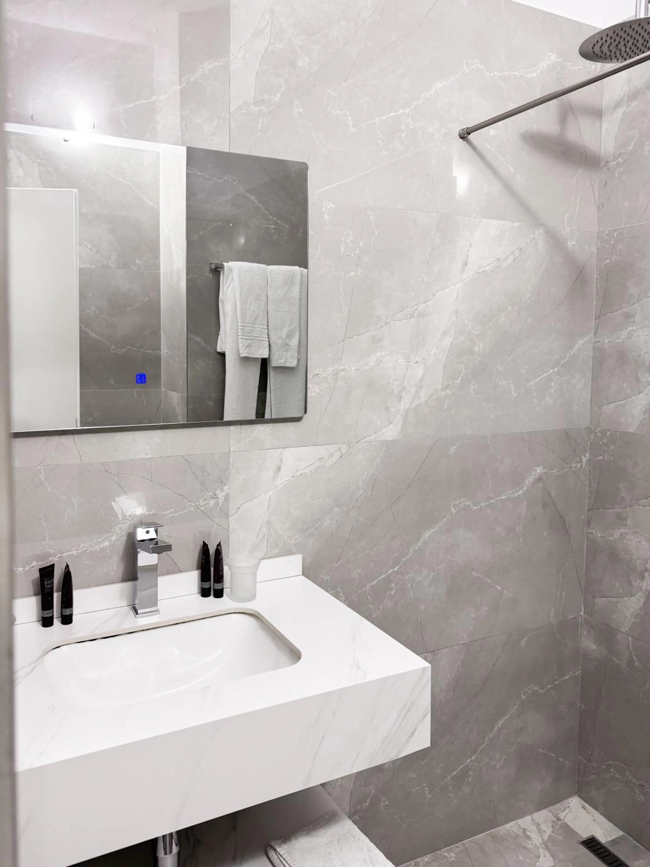 Bathroom in New Heaven Hotel