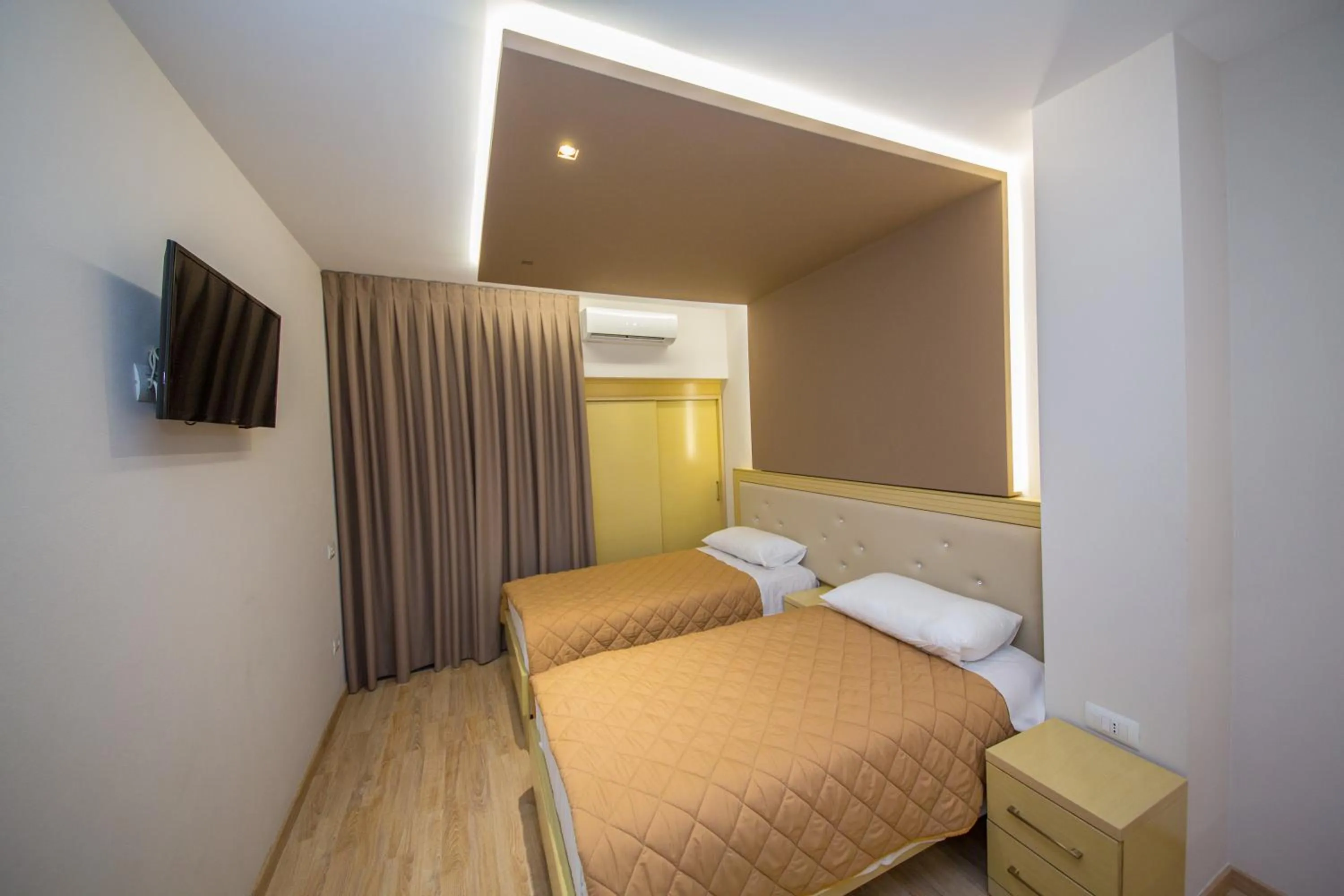 Photo of the whole room, Bed in New Heaven Hotel