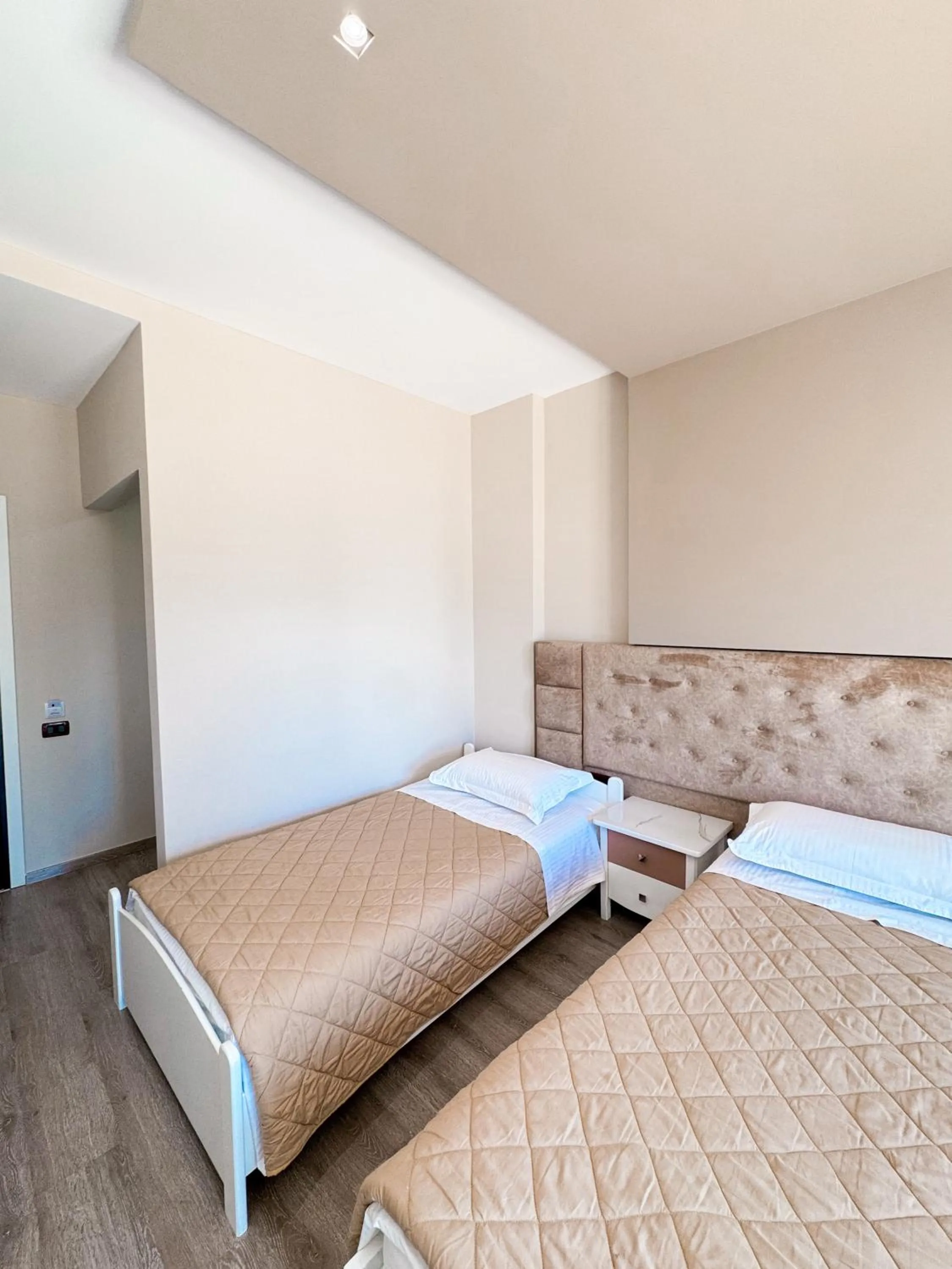 Bed in New Heaven Hotel