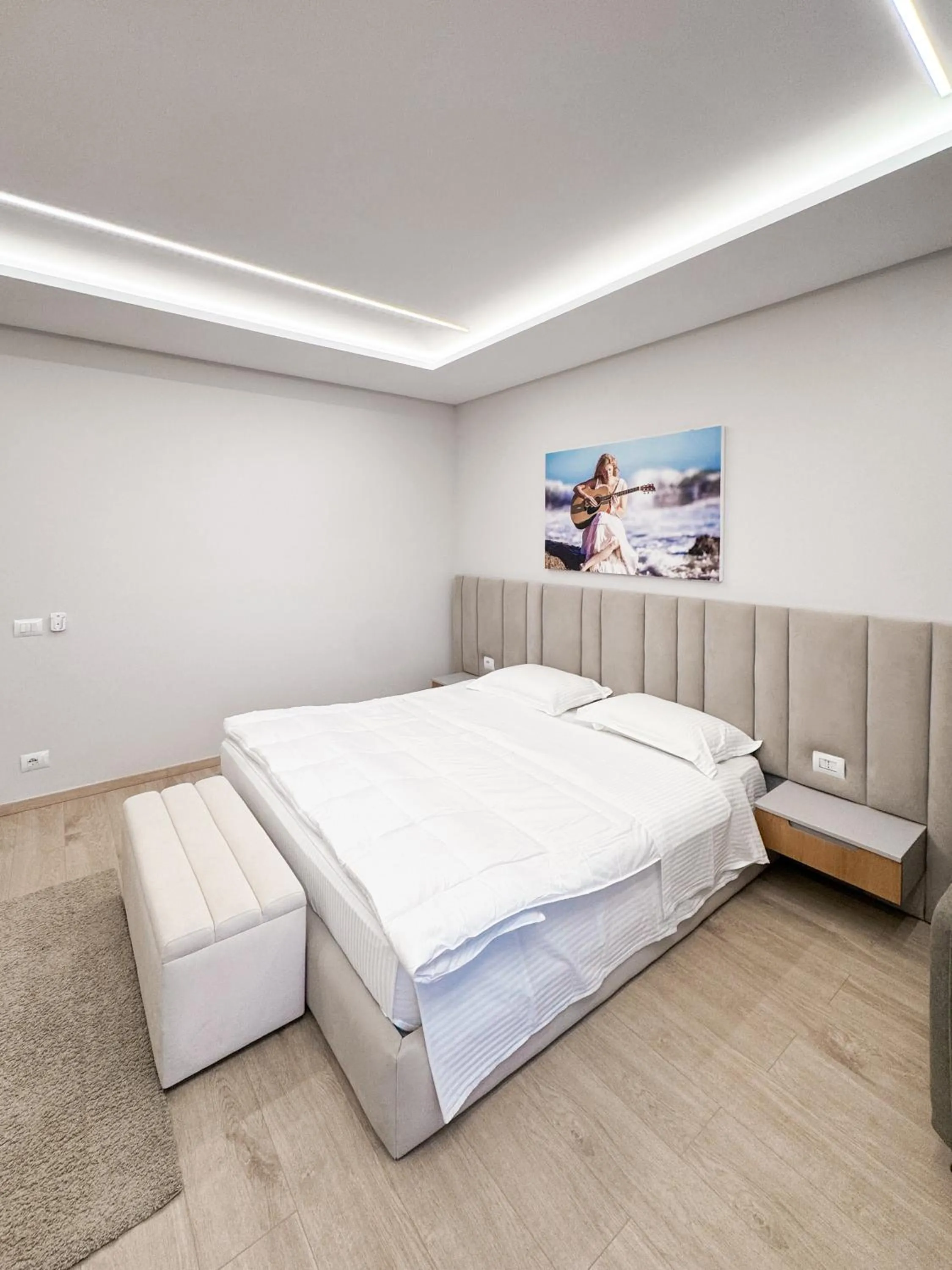 Photo of the whole room, Bed in New Heaven Hotel