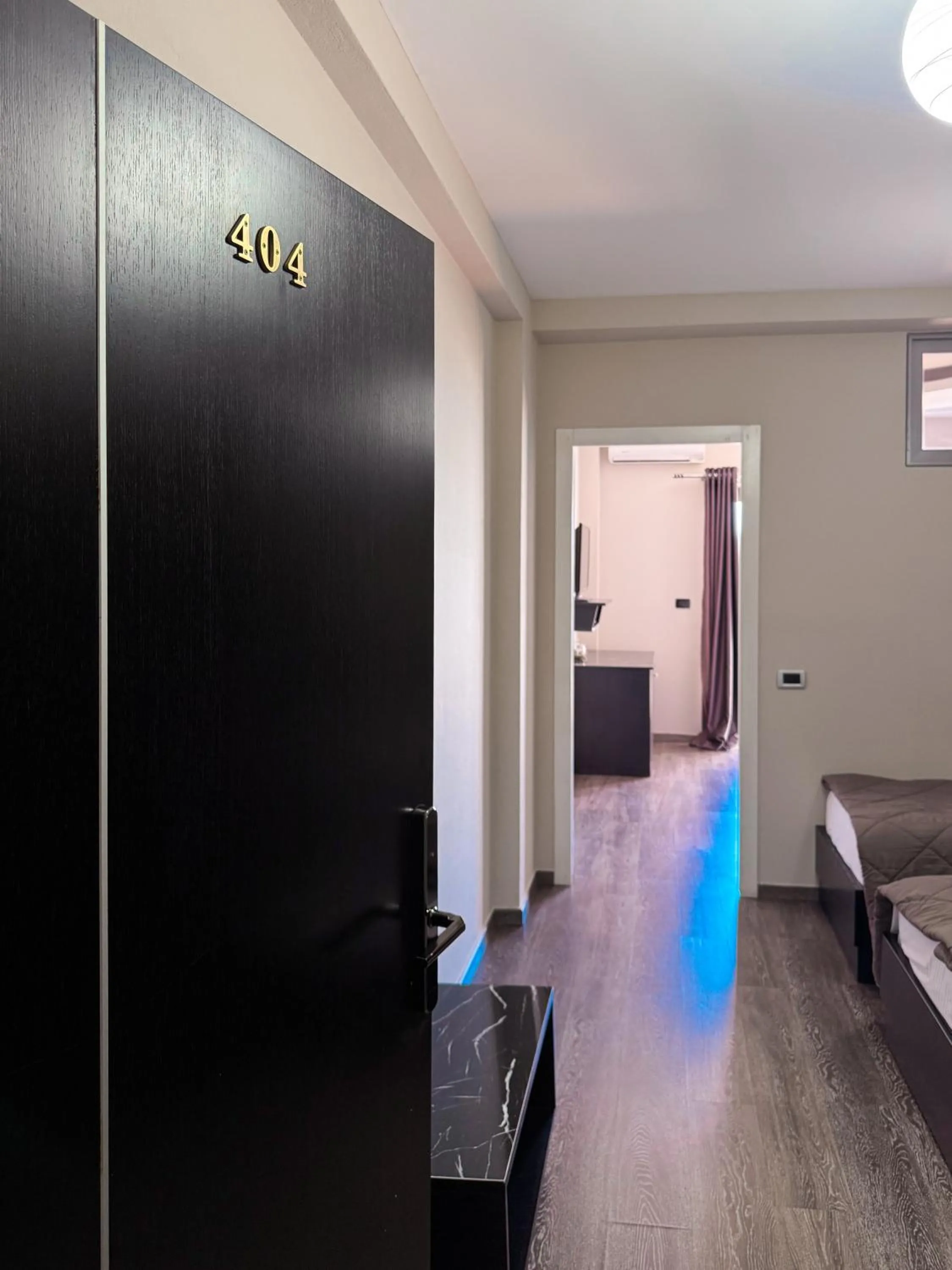Bedroom in New Heaven Hotel