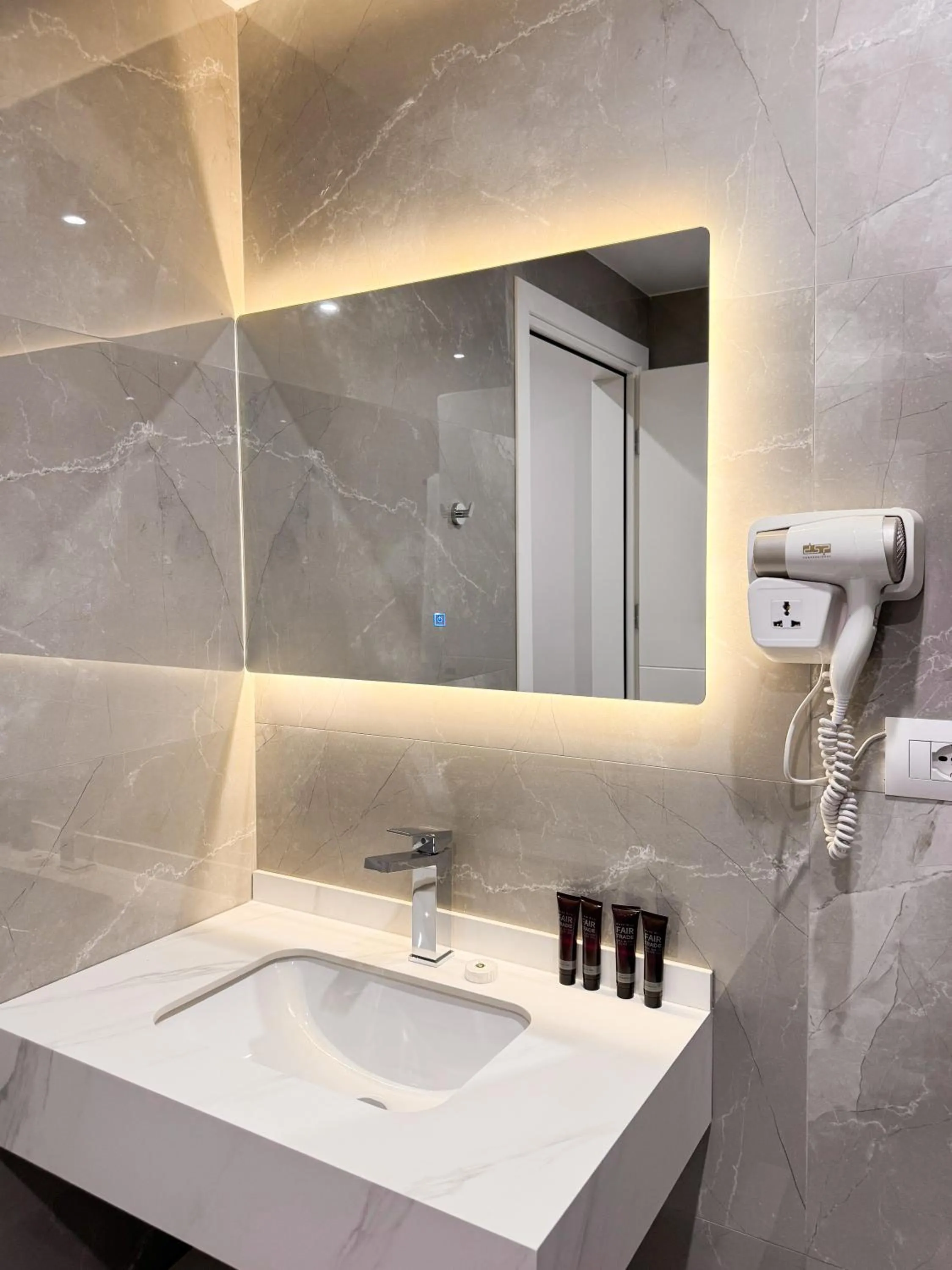Bathroom in New Heaven Hotel
