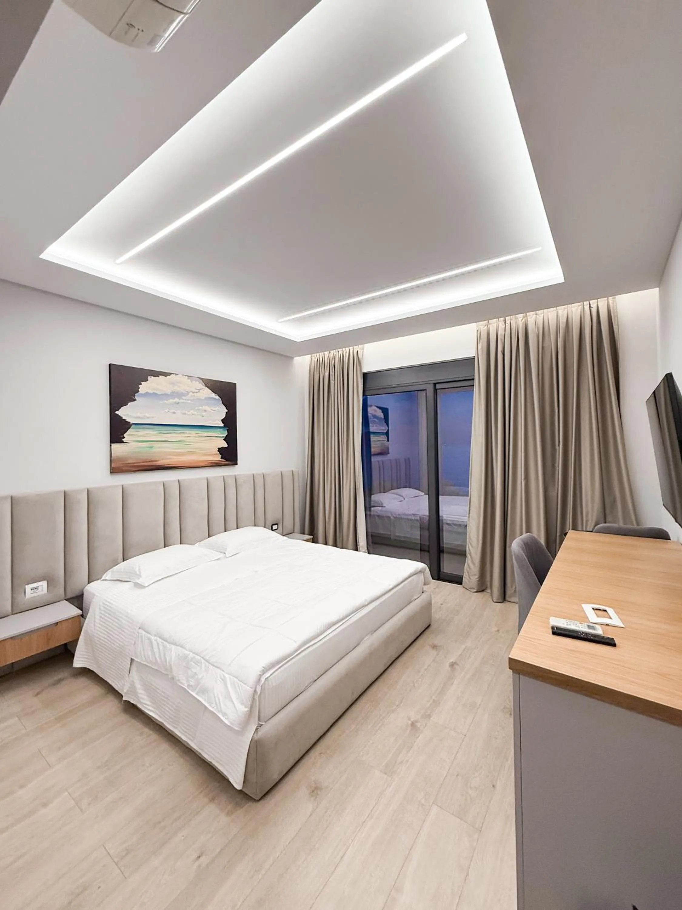 Photo of the whole room, Bed in New Heaven Hotel