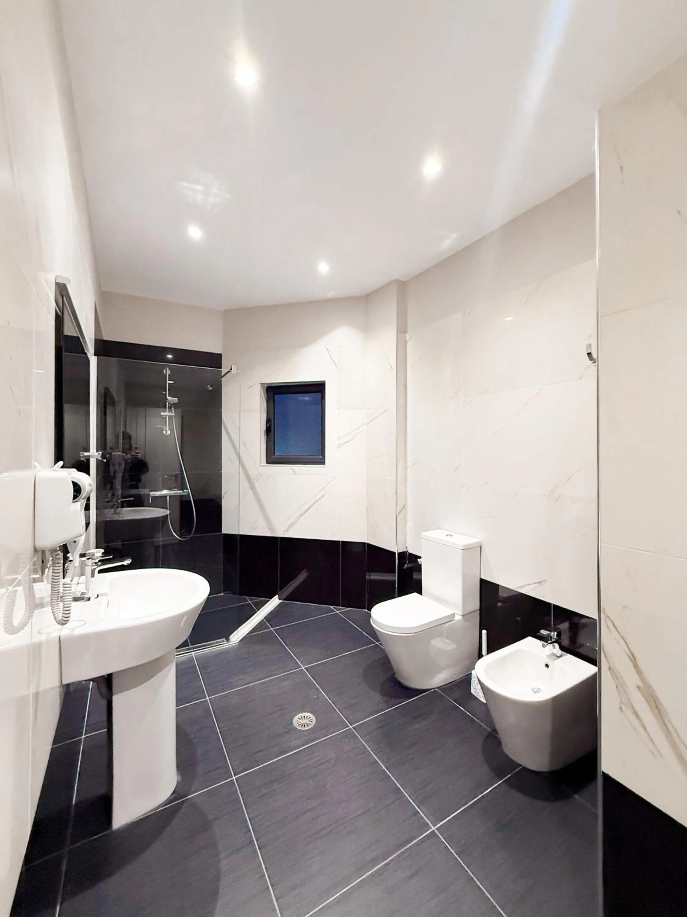 Bathroom in New Heaven Hotel