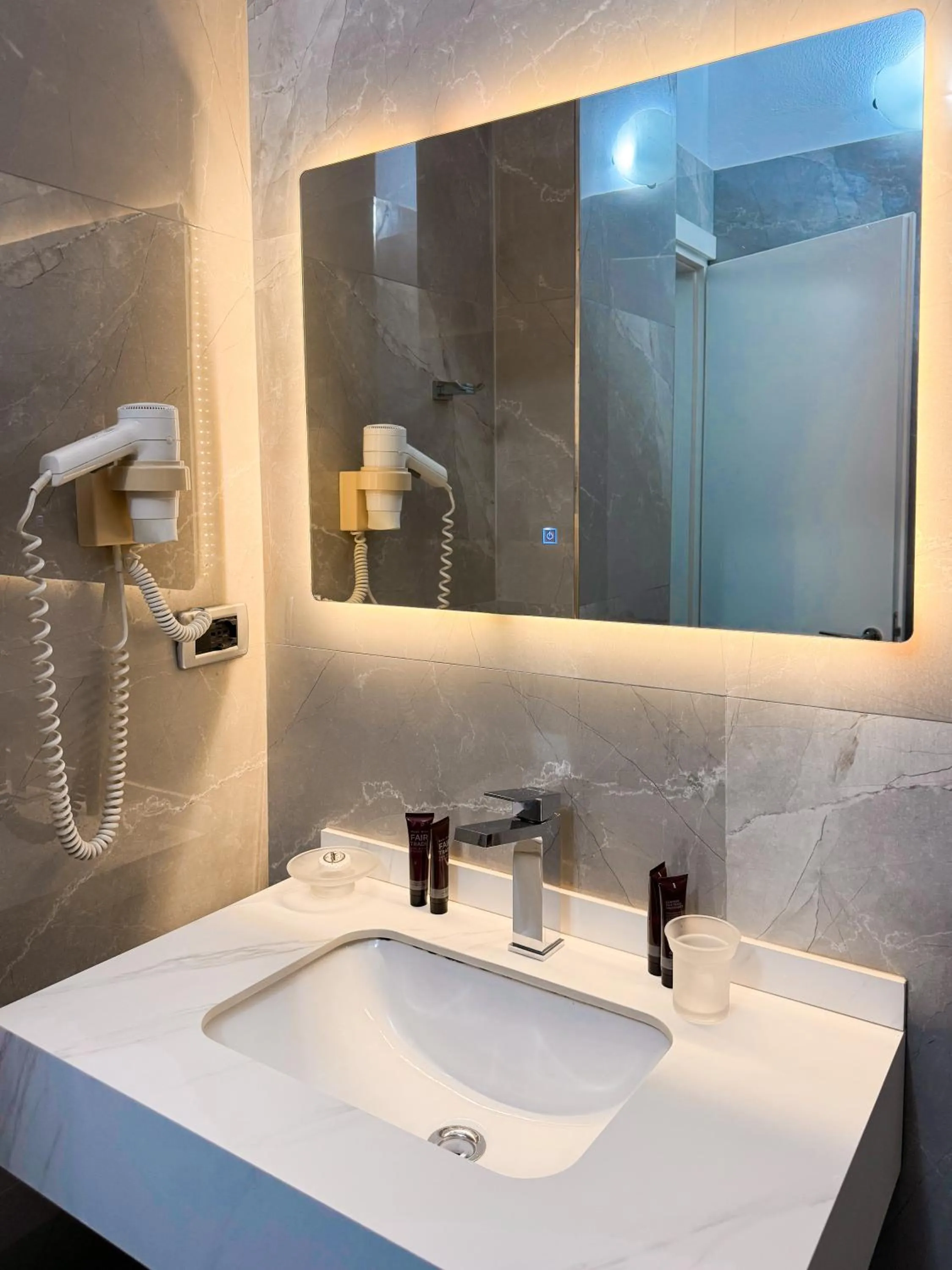 Bathroom in New Heaven Hotel