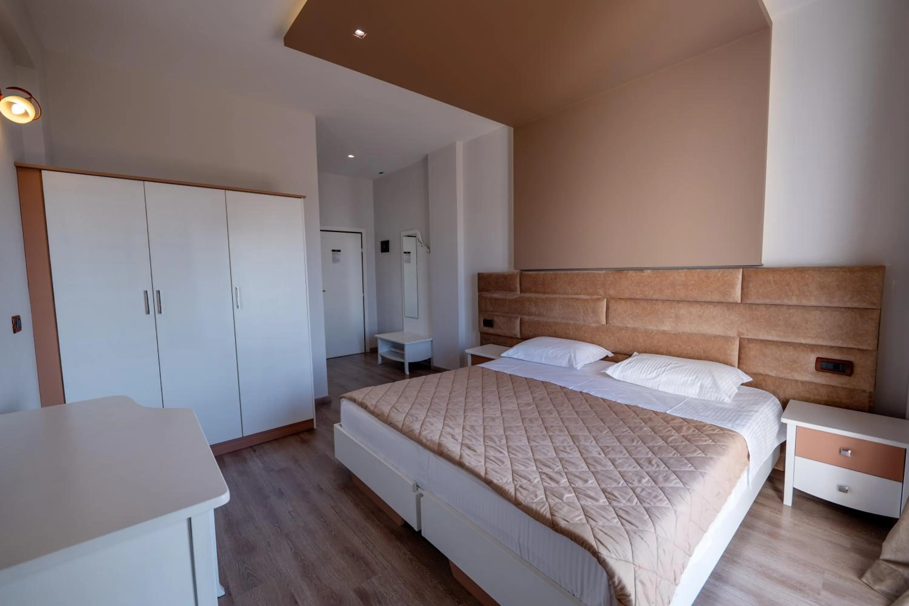 Bed in New Heaven Hotel