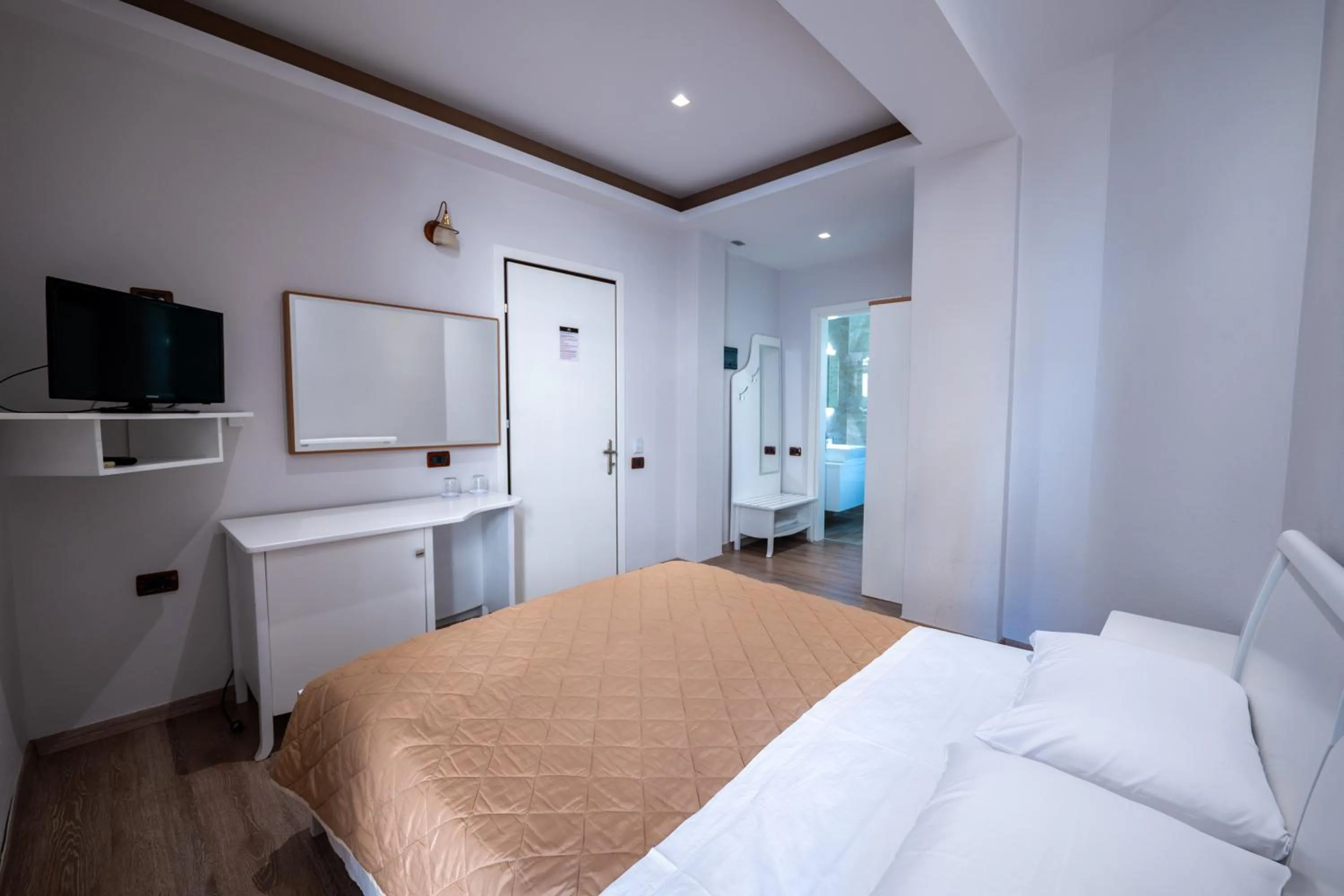 Bed in New Heaven Hotel