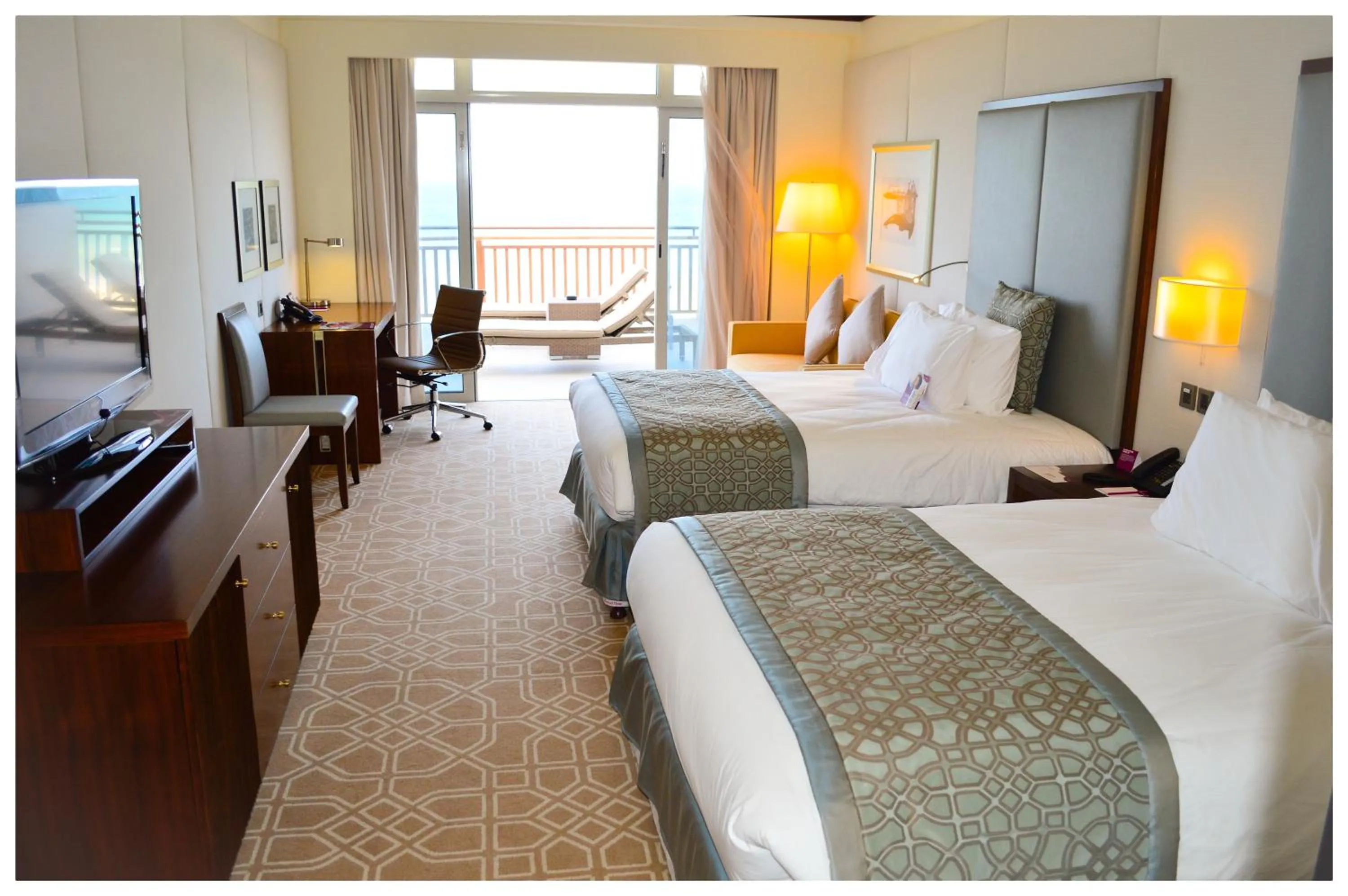 Photo of the whole room, Bed in Crowne Plaza Duqm by IHG
