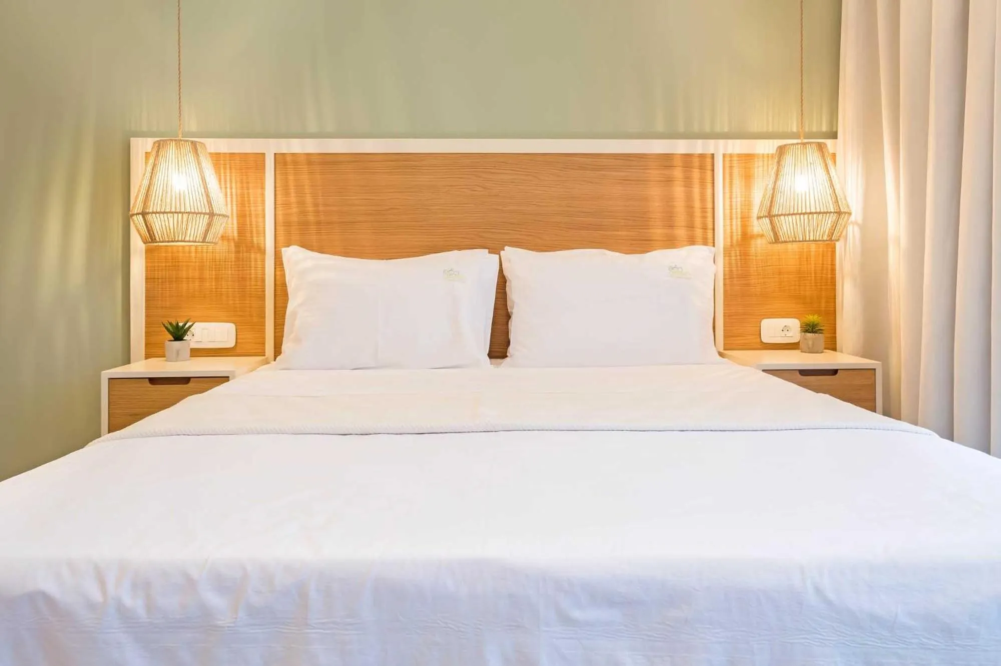 Bed in Eco Green Residences & Suites