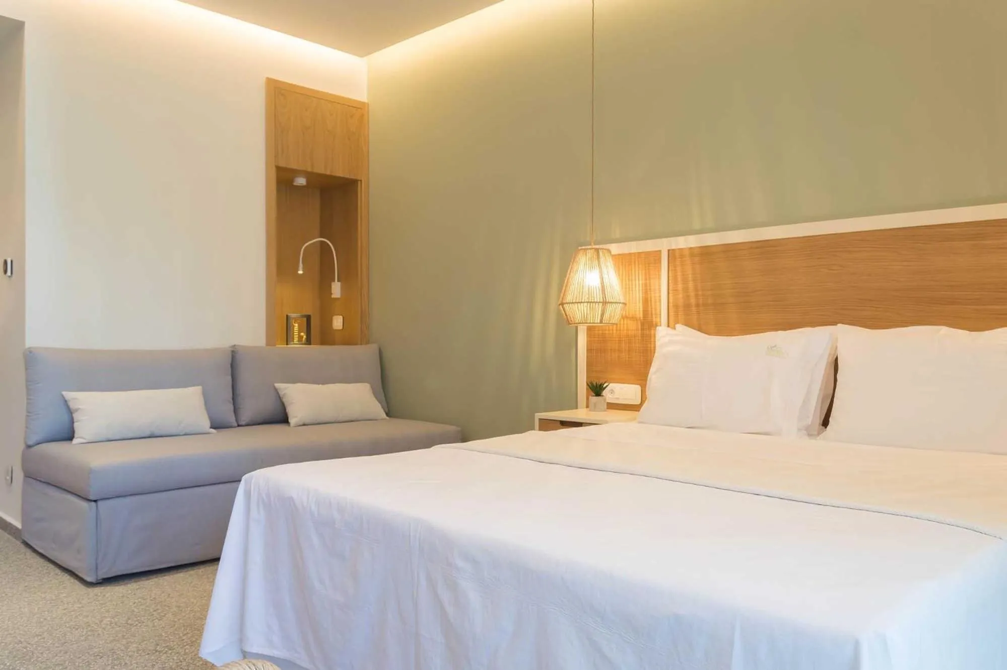 Bed in Eco Green Residences & Suites