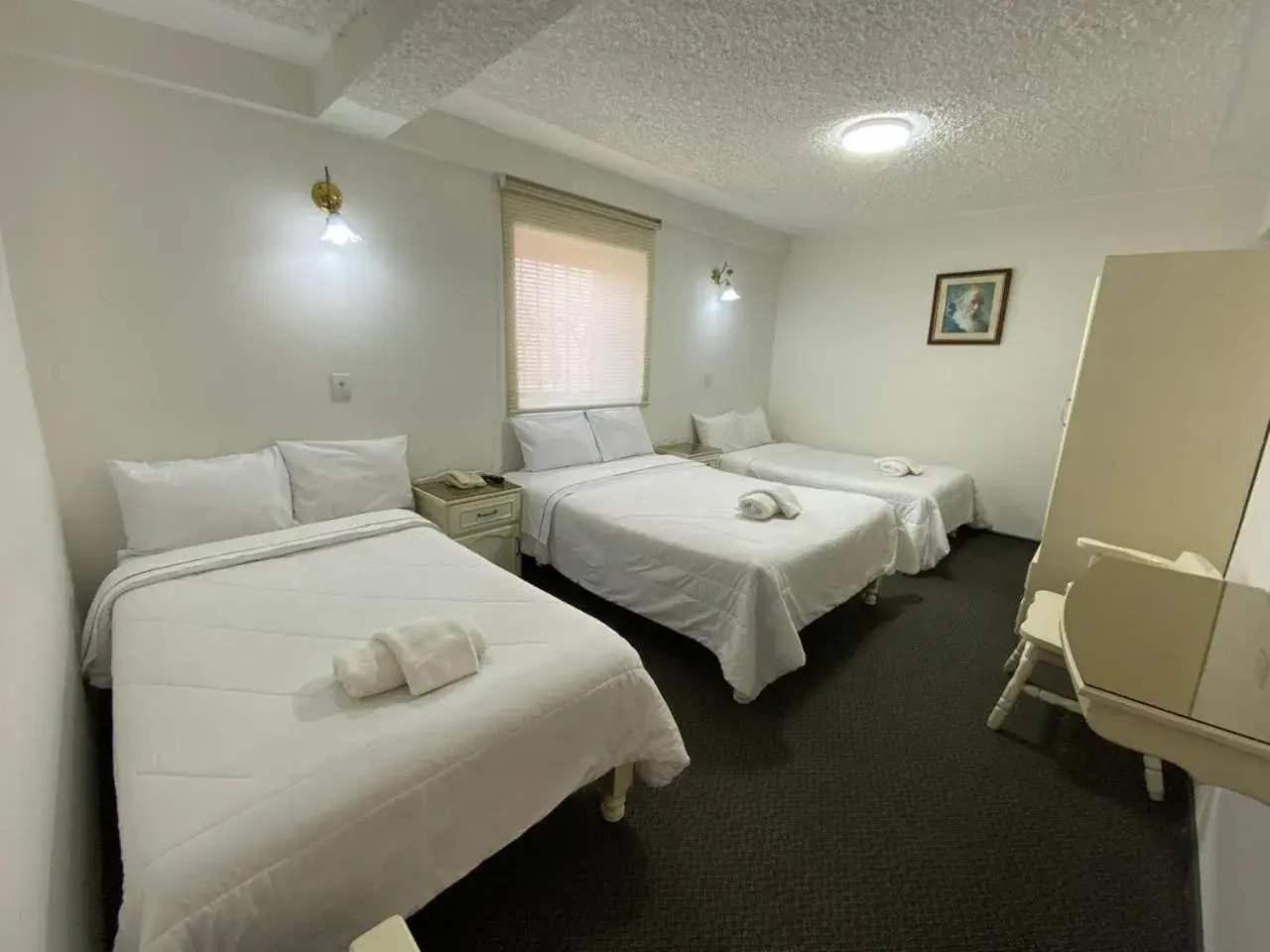 Classic Quadruple Room in Hotel San Francisco INN Classic Quadruple Room in Hotel San Francisco INN