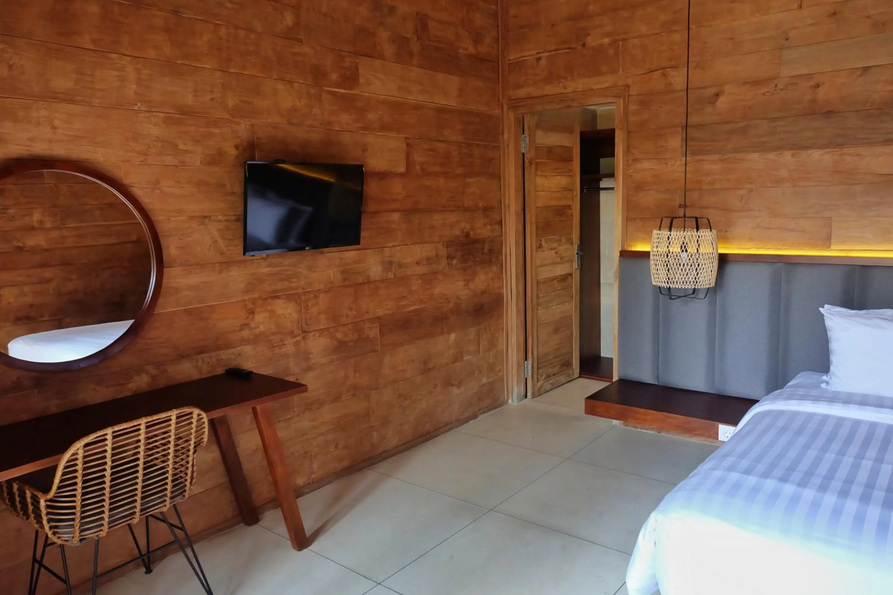 Communal lounge/ TV room, Bed in Rimbun Canggu Villa