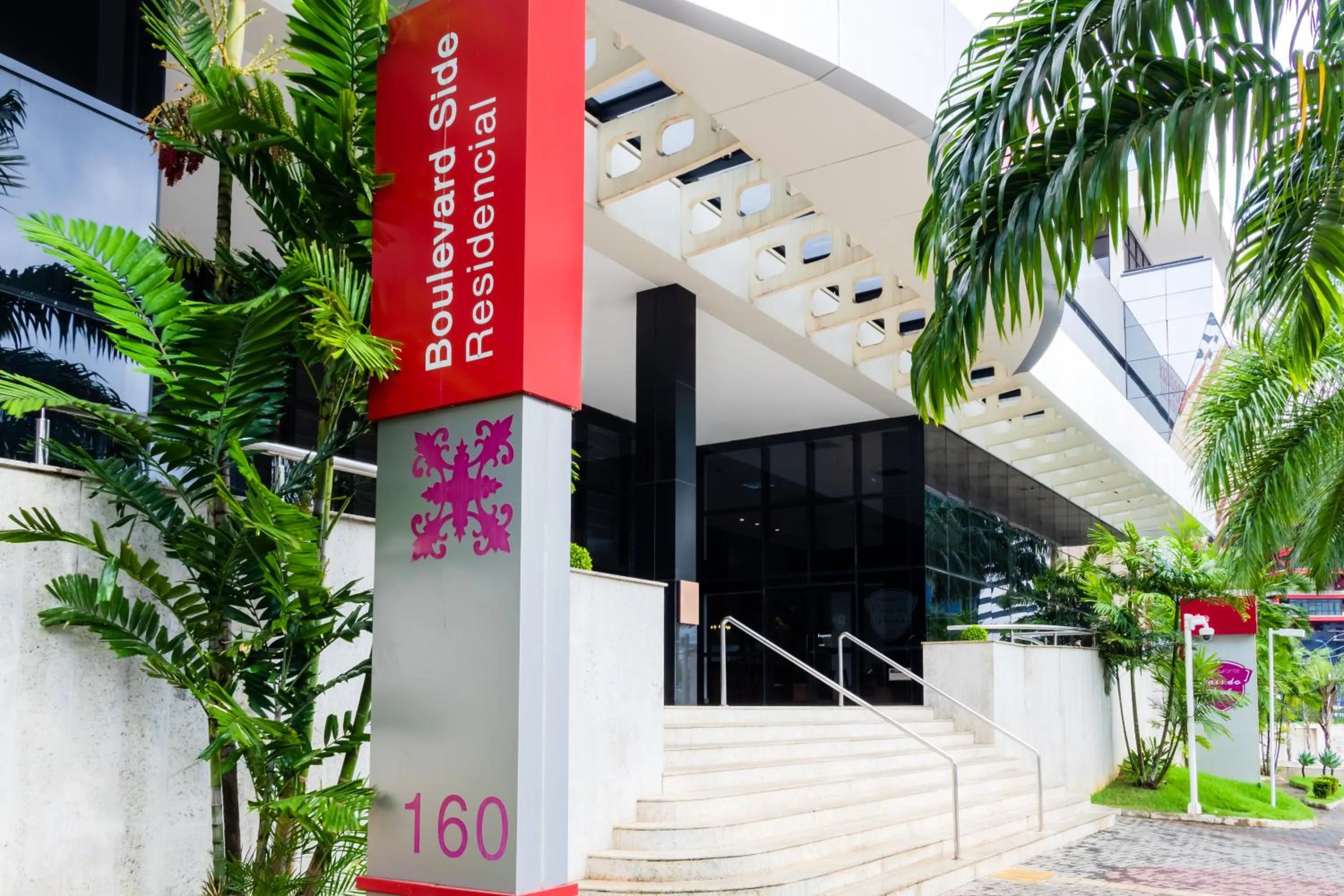 Property logo or sign in Boulevard Residencial