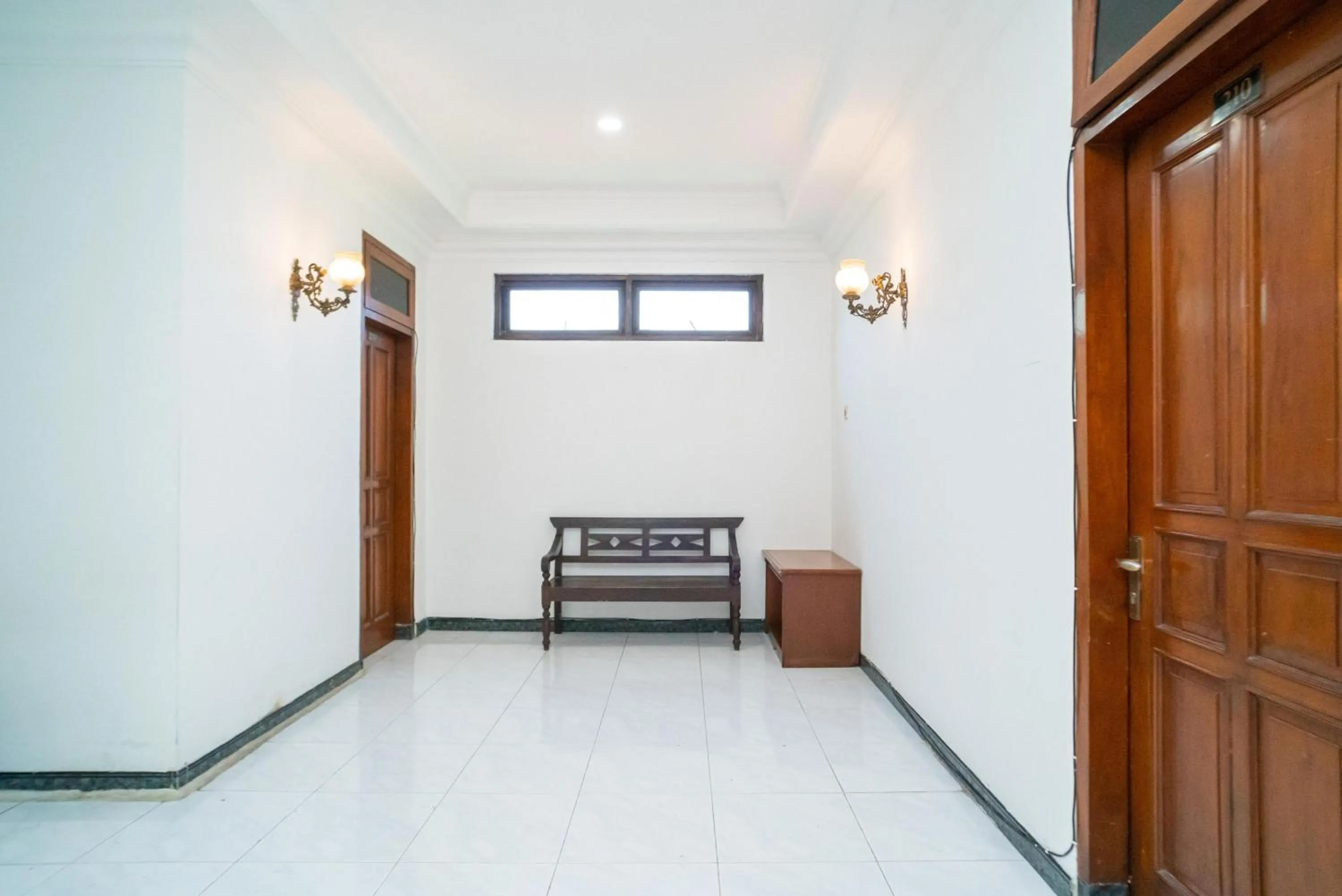 Seating area in RedDoorz Plus at Hotel Surya Solo