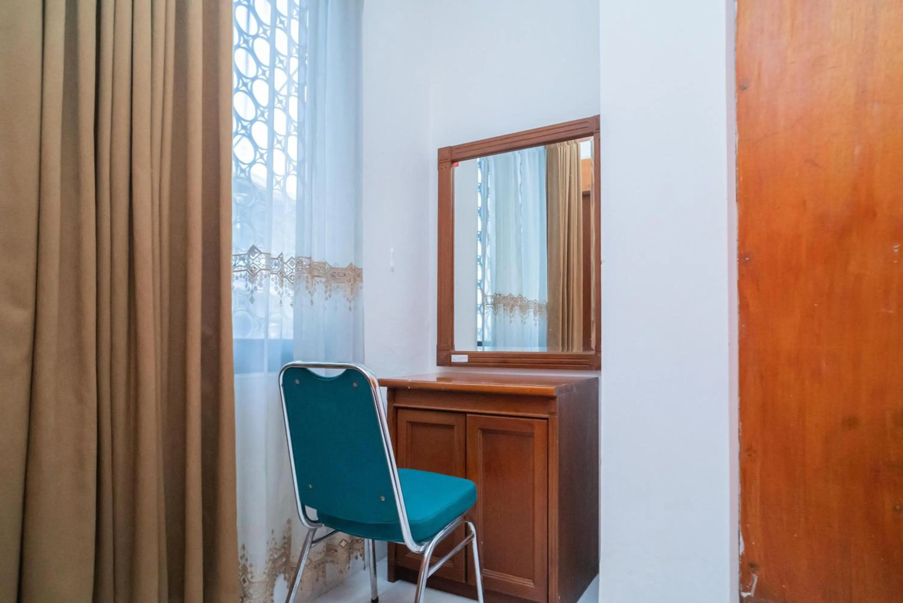 Bedroom in RedDoorz Plus at Hotel Surya Solo