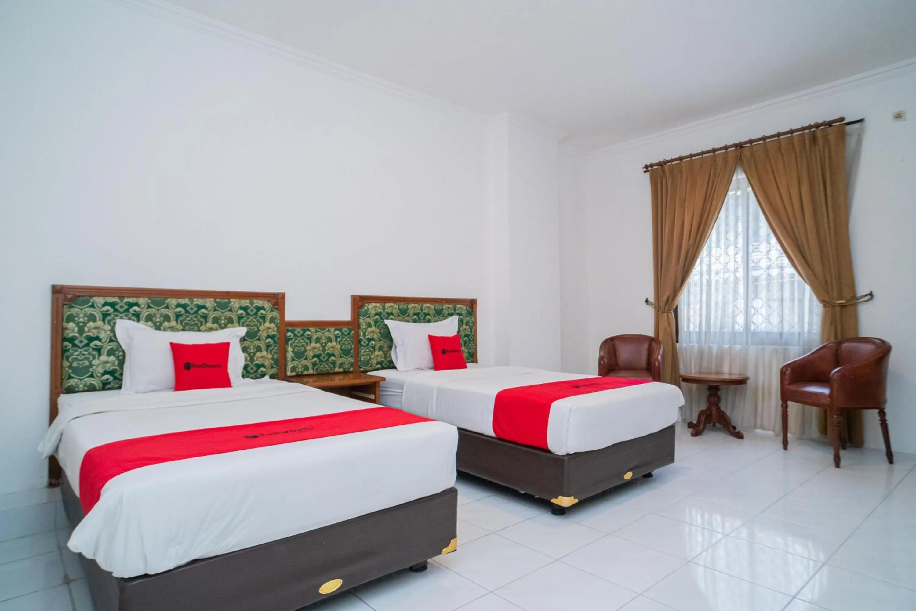 Bedroom, Bed in RedDoorz Plus at Hotel Surya Solo