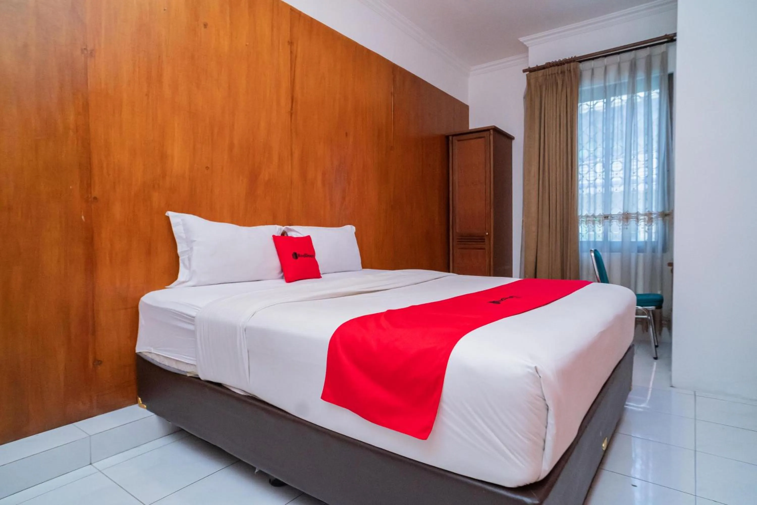 Bedroom, Bed in RedDoorz Plus at Hotel Surya Solo