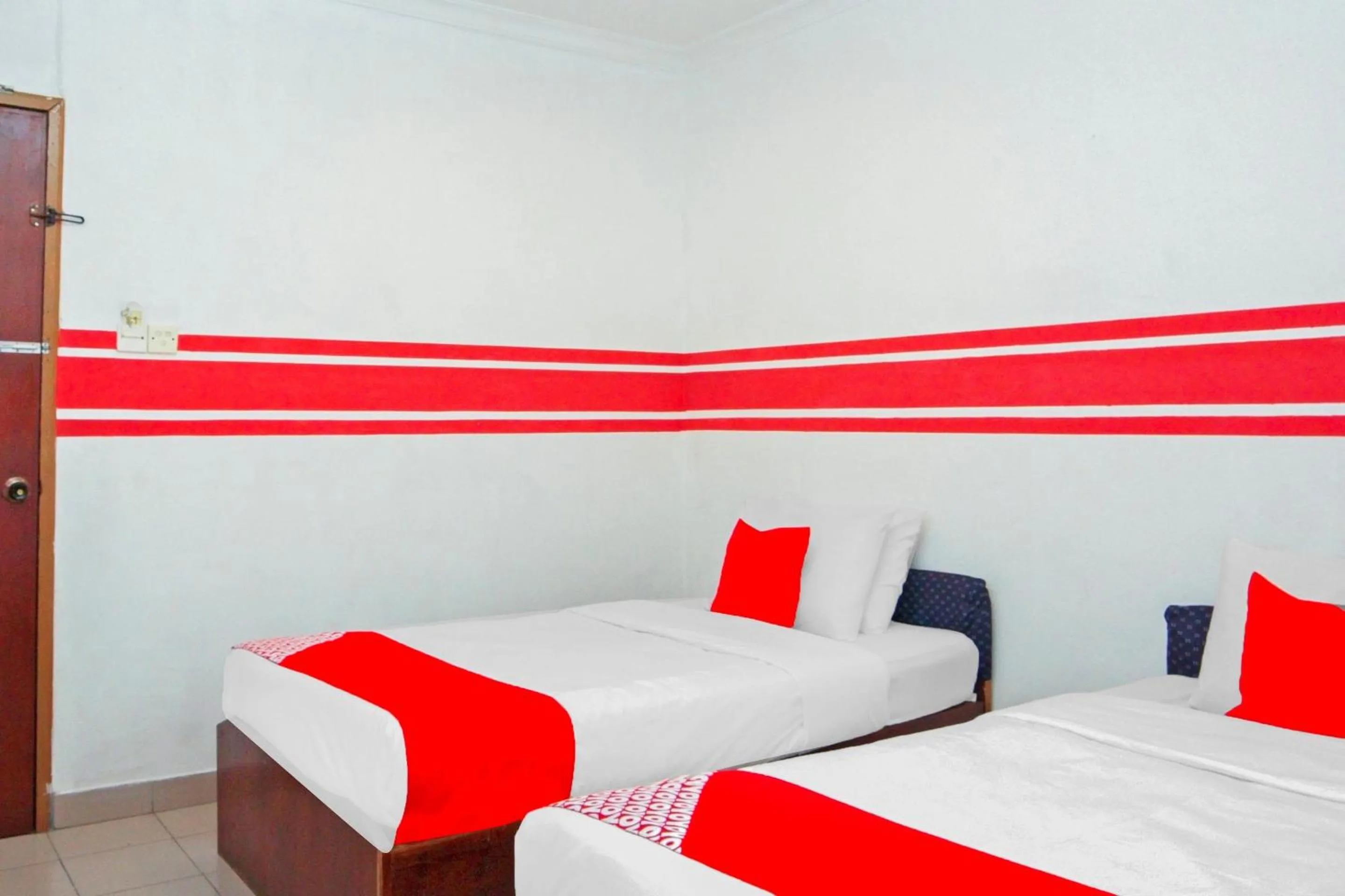 Bedroom, Bed in OYO 1173 Mandyrin Hotel